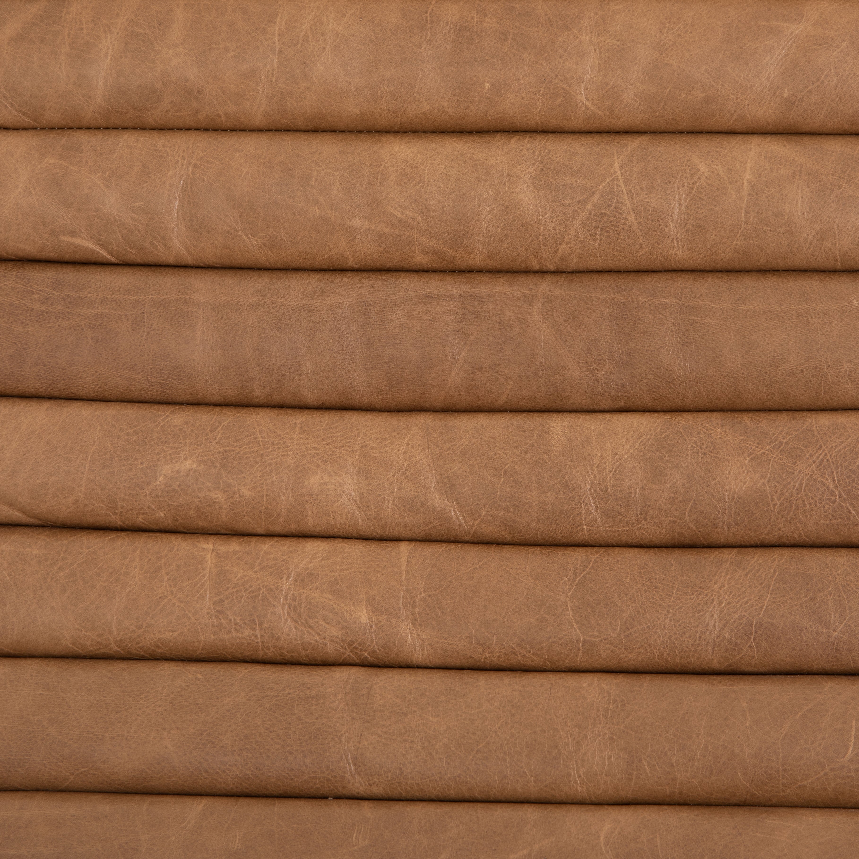 Featuring Chance Warm Taupe Dakota Leather Recliner by Four Hands at Amethyst Home. The Chance Recliner has an invitingly curved seat with dramatic horizontal channels is covered in soft, camel-colored top-grain leather. Rich, tonal frame captures alluring negative—and positive—spaces. A push recliner takes this forward-thinking lounger to the next level.
Ove.  Amethyst Home provides interior design, new home construction design consulting, vintage area rugs, and lighting in the Austin metro area.