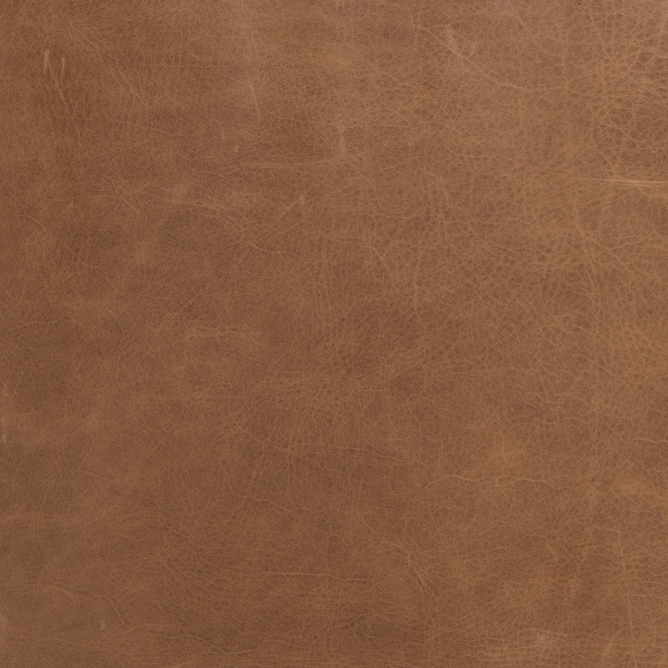 Featuring Chance Warm Taupe Dakota Leather Recliner by Four Hands at Amethyst Home. The Chance Recliner has an invitingly curved seat with dramatic horizontal channels is covered in soft, camel-colored top-grain leather. Rich, tonal frame captures alluring negative—and positive—spaces. A push recliner takes this forward-thinking lounger to the next level..  Amethyst Home provides interior design, new home construction design consulting, vintage area rugs, and lighting in the Washington metro area.