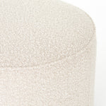 Featuring Sinclair Round Ottoman - Knoll Natural by Four Hands at Amethyst Home. This round ottoman of textural cream boucle can be placed just about anywhere, bringing with it a hip retro vibe.
Overall Dimensions: 22"W x 22"L x 18.50"HColors: Distressed Natural, Knoll NaturalMaterials: Solid Parawood, 95% Pl, 5% PcFabric: PerformanceWeight: 13.23 lbVolum.  Amethyst Home provides interior design, new home construction design consulting, vintage area rugs, and lighting in the Des Moines metro area.