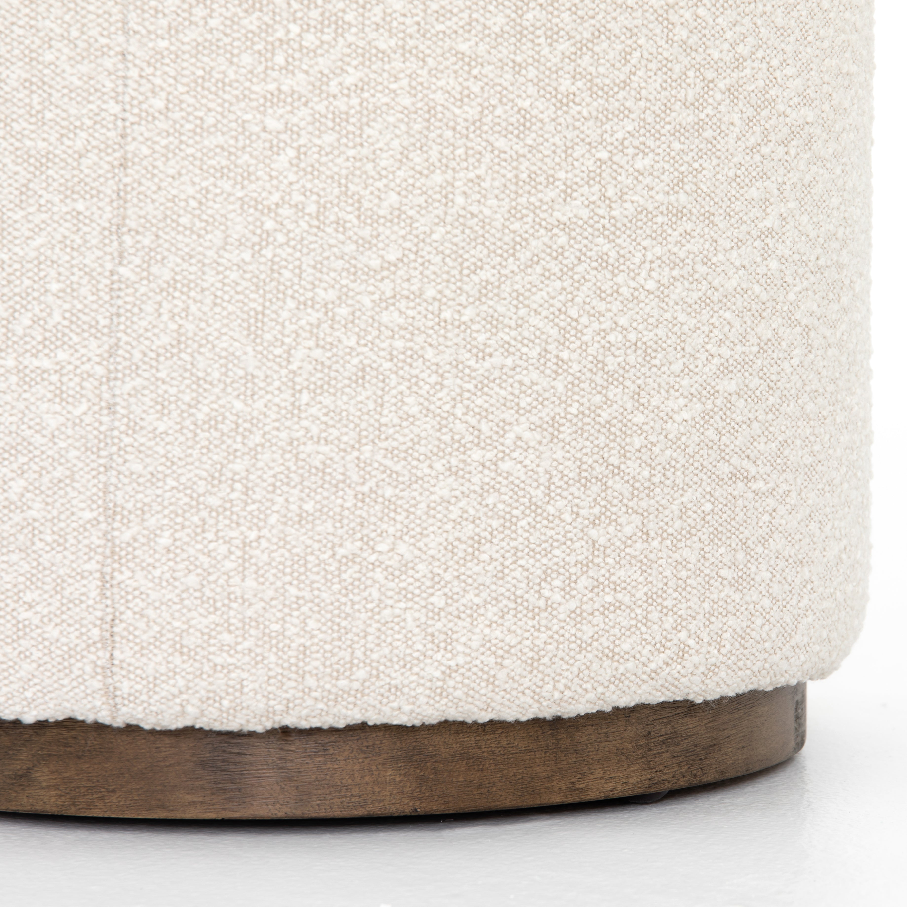 Featuring Sinclair Round Ottoman - Knoll Natural by Four Hands at Amethyst Home. This round ottoman of textural cream boucle can be placed just about anywhere, bringing with it a hip retro vibe.
Overall Dimensions: 22"W x 22"L x 18.50"HColors: Distressed Natural, Knoll NaturalMaterials: Solid Parawood, 95% Pl, 5% PcFabric: PerformanceWeight: 13.23 lbVolum.  Amethyst Home provides interior design, new home construction design consulting, vintage area rugs, and lighting in the Alpharetta metro area.