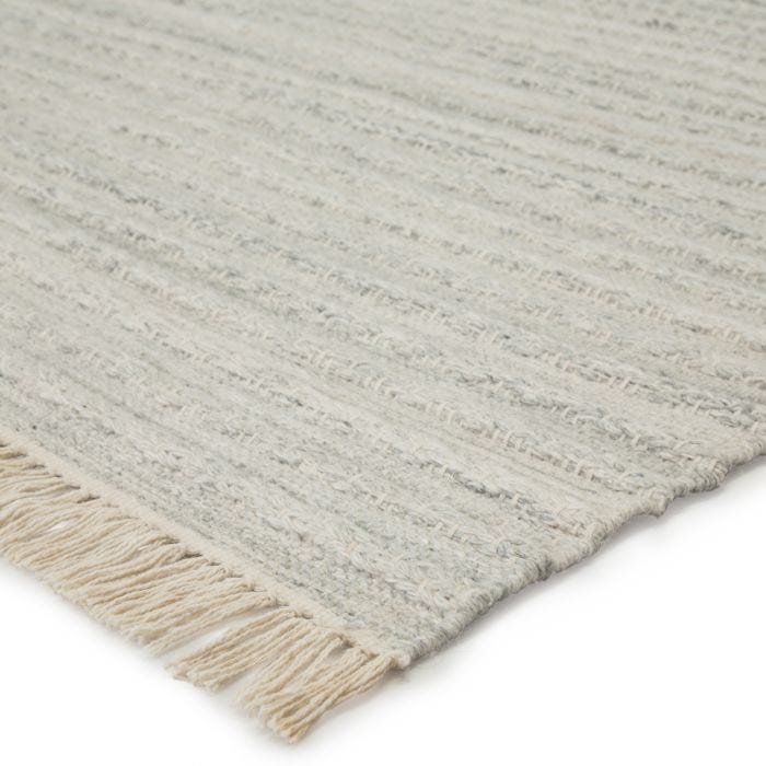 Featuring Castillo Torre Rug by Jaipur Living at Amethyst Home. The handwoven Castillo Torre rug features a soft feel and relaxed, versatile style. The Torre area rug showcases a blend of light gray and cream tones for a grounding, neutral look. Crafted of PET yarn or recycled plastic, this durable and textured rug brings warmth and inviting appeal to indoor.  Amethyst Home provides interior design, new home construction design consulting, vintage area rugs, and lighting in the Seattle metro area.