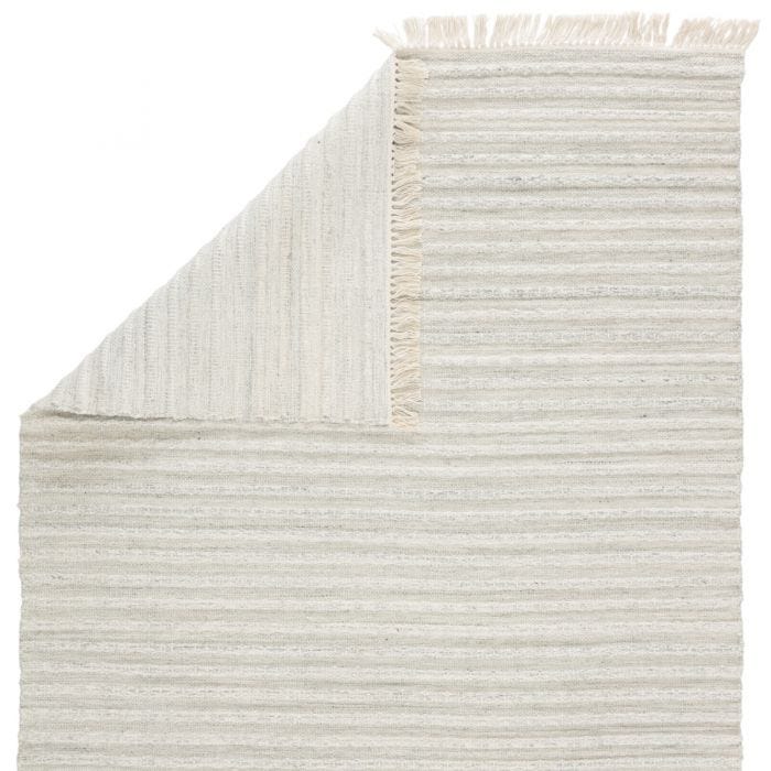 Featuring Castillo Torre Rug by Jaipur Living at Amethyst Home. The handwoven Castillo Torre rug features a soft feel and relaxed, versatile style. The Torre area rug showcases a blend of light gray and cream tones for a grounding, neutral look. Crafted of PET yarn or recycled plastic, this durable and textured rug brings warmth and inviting appeal to .  Amethyst Home provides interior design, new home construction design consulting, vintage area rugs, and lighting in the Newport Beach metro area.