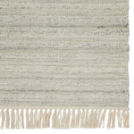 Featuring Castillo Torre Rug by Jaipur Living at Amethyst Home. The handwoven Castillo Torre rug features a soft feel and relaxed, versatile style. The Torre area rug showcases a blend of light gray and cream tones for a grounding, neutral look. Crafted of PET yarn or recycled plastic, this durable and textured rug brings warmth and inviting appeal to indoo.  Amethyst Home provides interior design, new home construction design consulting, vintage area rugs, and lighting in the Portland metro area.