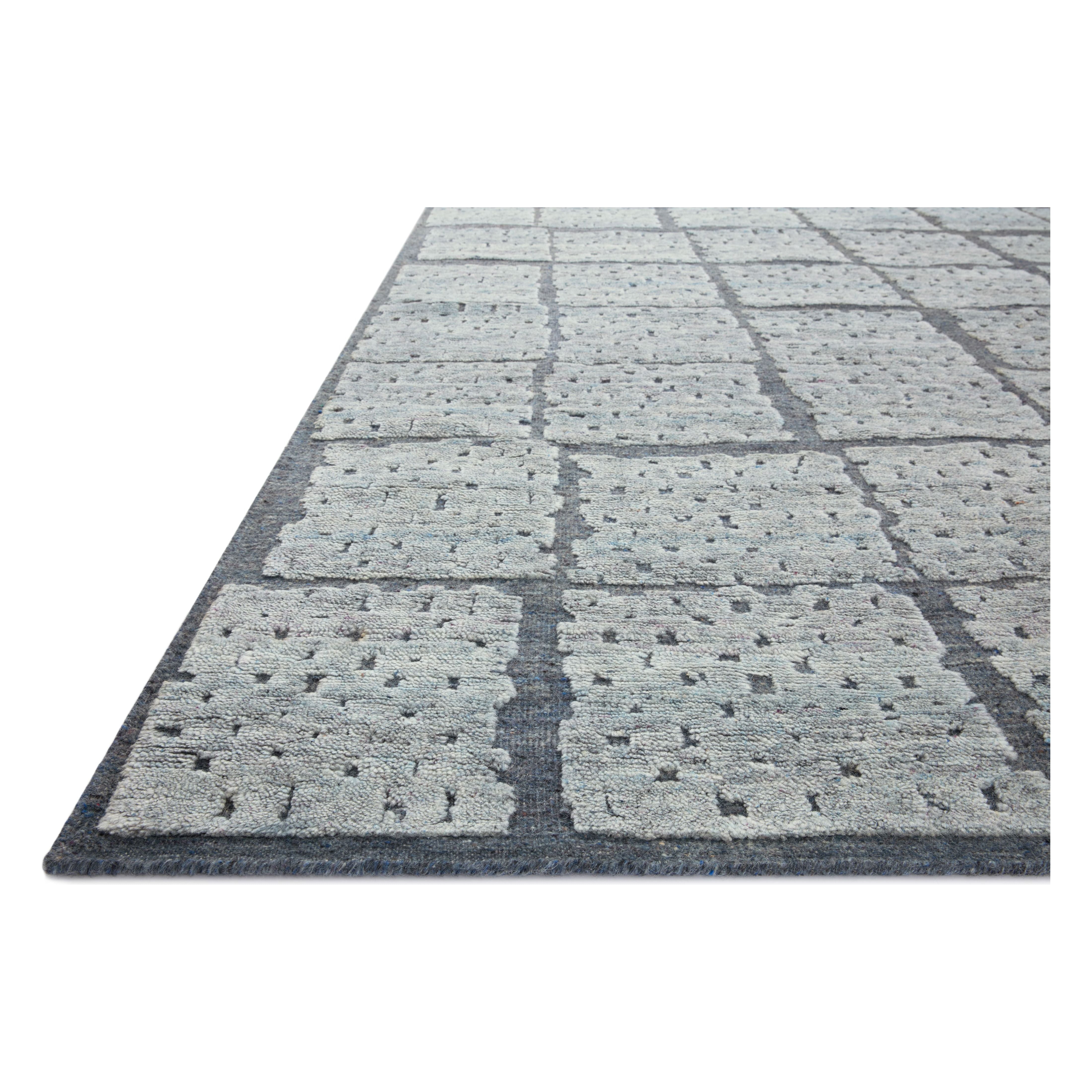 Featuring Carrier & Company x Loloi Moore Denim / Sky Hand-Knotted Rug by Loloi at Amethyst Home. The Moore Collection for Carrier and Company x Loloi is a sophisticated area rug with a subtle interplay of higher, lighter tone pile above a deeper-toned base pile. Abstract geometric patterns in airy, neutral palettes create a sense of freshness and textured.  Amethyst Home provides interior design, new home construction design consulting, vintage area rugs, and lighting in the Nashville metro area.