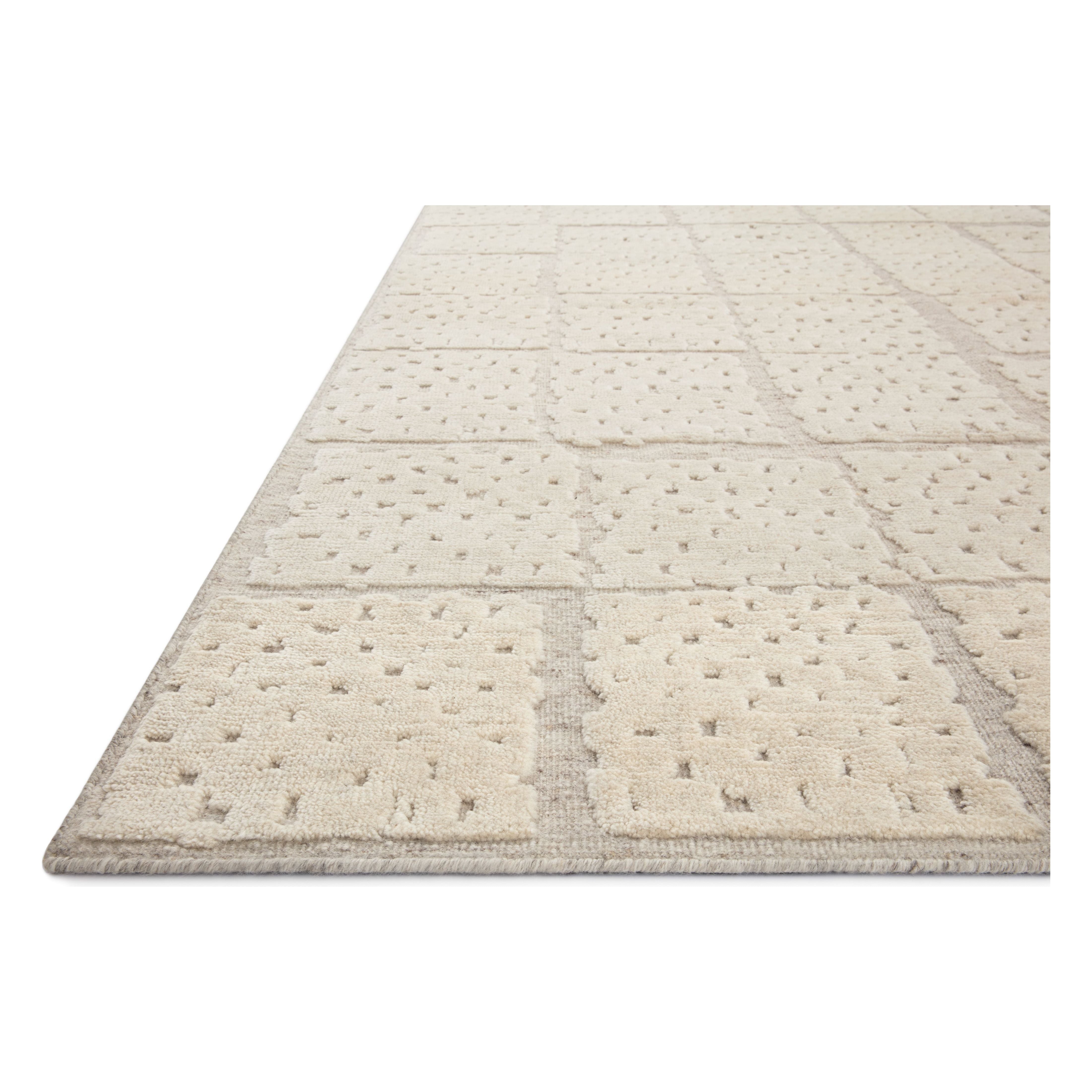 Featuring Carrier & Company x Loloi Moore Pebble / Ivory Hand-Knotted Rug by Loloi at Amethyst Home. The Moore Collection for Carrier and Company x Loloi is a sophisticated area rug with a subtle interplay of higher, lighter tone pile above a deeper-toned base pile. Abstract geometric patterns in airy, neutral palettes create a sense of freshness and textur.  Amethyst Home provides interior design, new home construction design consulting, vintage area rugs, and lighting in the Portland metro area.