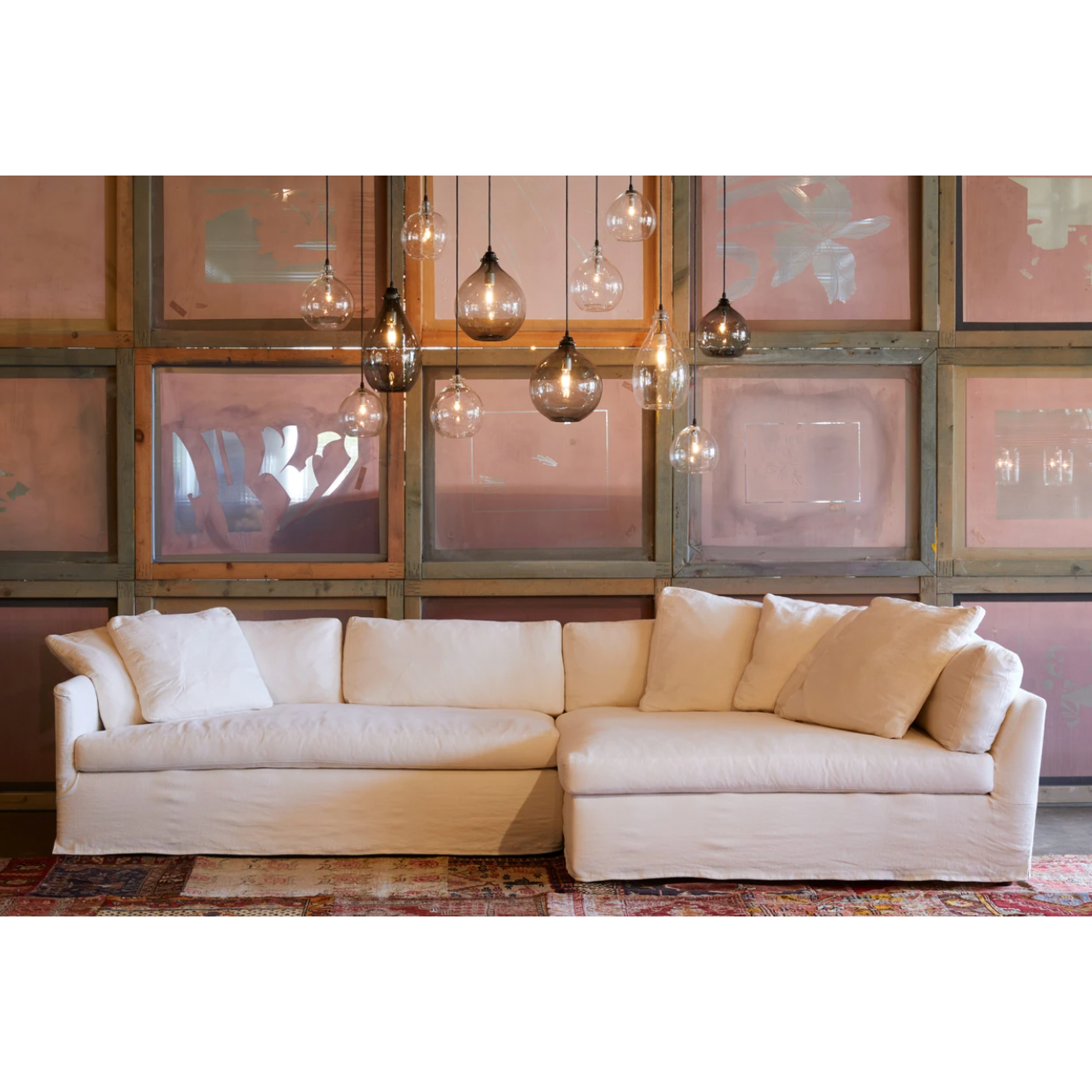 Featuring Harbor 2 Piece Sectional by Cisco Brothers at Amethyst Home. A chic, yet simple design, the Gunner Upholstered Sofa by Cisco Brothers boasts a streamlined frame supported by tapered legs. This sofa is beautifully detailed, with piping on the body and top stitch on cushions. It has a traditional yet sleek look, ideal for entertaining. Photographed in. Amethyst Home provides interior design, new home construction design consulting, vintage area rugs, and lighting in the Tampa metro area.