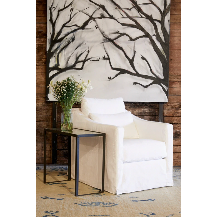 Featuring Rebecca Chair - Essentials by Cisco Brothers at Amethyst Home. The Rebecca Chair by Cisco Brothers has a stunning silhouette draped in a graceful slip skirt with a neat kick-pleat detail. With a lumbar pillow for extra comfort, this tranquil chair will bring relaxation and ease into your home. Photographed in Denim White.
Overall: 30"w x 35"d x 31. Amethyst Home provides interior design, new home construction design consulting, vintage area rugs, and lighting in the Seattle metro area.