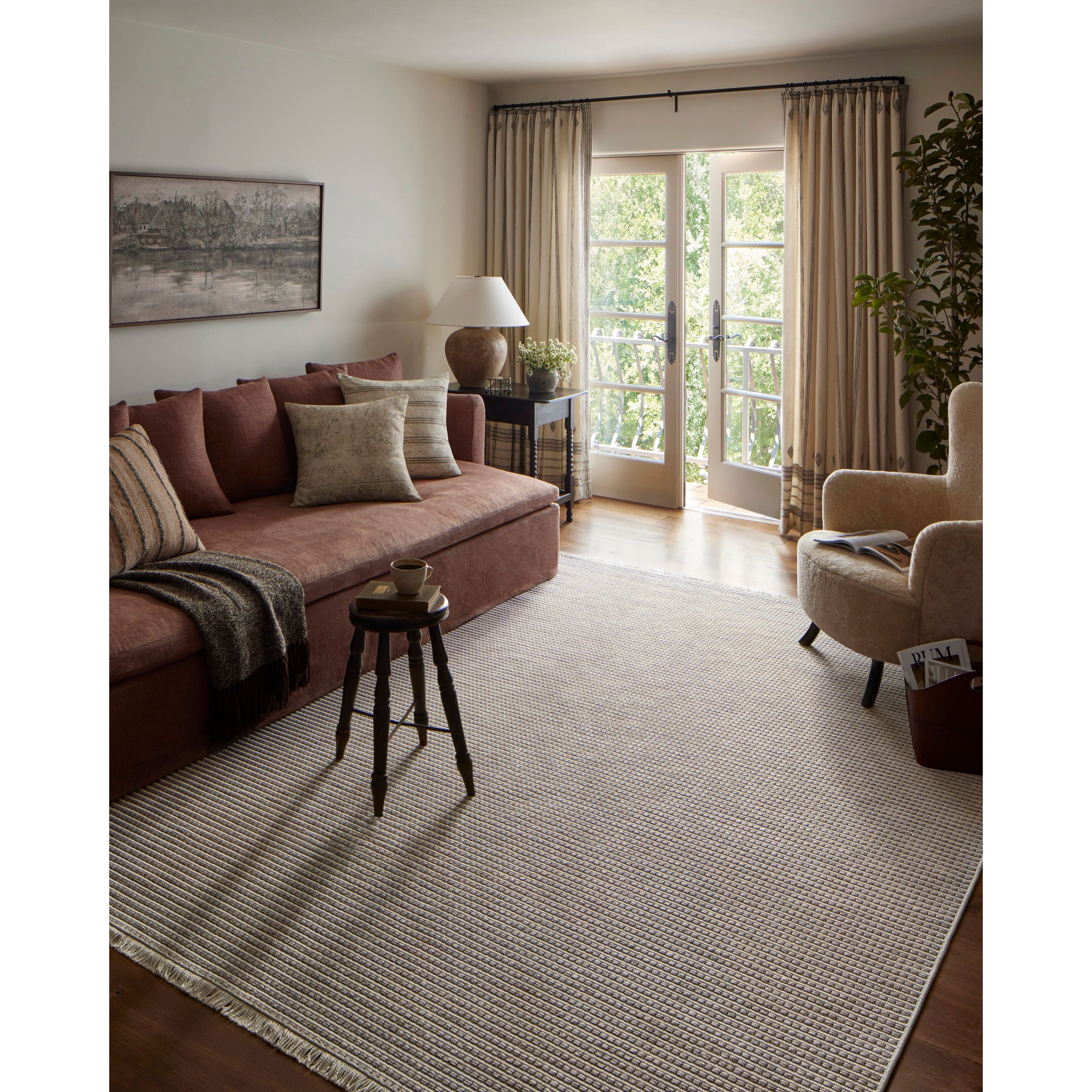 Featuring Amber Lewis x Loloi Malibu Ivory / Dove Rug by Loloi at Amethyst Home. The Malibu Collection is an indoor/outdoor area rug by Amber Lewis x Loloi that channels the casual modern vibe of the beach city it’s named after. The rug’s neutral-toned geometric prints are easy to match with a range of decor styles, while a hint of fringe adds to the breezy aesthetic. This coll. Amethyst Home provides interior design, new construction, custom furniture, and area rugs in the Kansas City metro area.