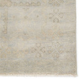 Featuring Eloquent Chival Hand-Knotted Rug by Jaipur Living at Amethyst Home. The Eloquent Chival Area Rug emanates traditional elegance, lending a soft and serene look to transitional homes. The Chival area rug features a washed vintage-inspired design in muted gray and beige tones. This hand-knotted wool rug grounds living spaces with a classic, stately look.  Amethyst Home provides interior design, new home construction design consulting, vintage area rugs, and lighting in the Omaha metro area.