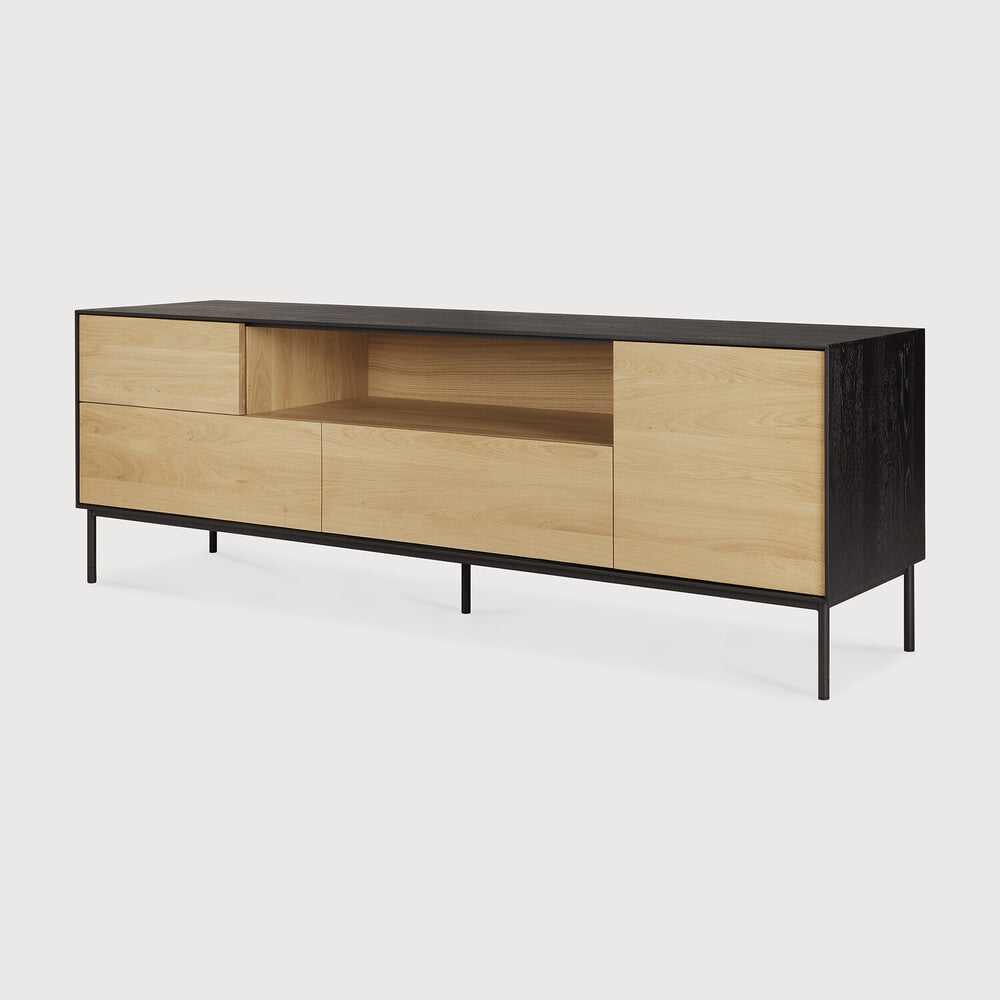 Featuring Blackbird TV Cupboard Oak by Ethnicraft at Amethyst Home. For our Blackbird collection, designer Alain van Havre brings together opposing elements, combining soft round legs and eye-catching graphic lines into light and airy designs.
Dimensions: 18"d x 71"w x 24.5"h
Anti-tipping mechanism : YesBrushed : This finishing gives our furniture more depth. . Amethyst Home provides interior design, new home construction design consulting, vintage area rugs, and lighting in the Dallas metro area.