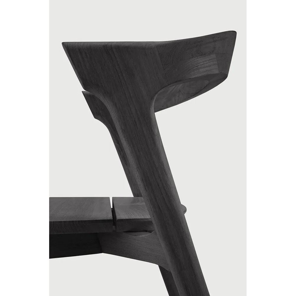 Featuring Bok Outdoor Dining Chair by Ethnicraft at Amethyst Home. Reminiscent of a goat's curved horns, the Bok collection combines sculptural elegance and contemporary crafting into a graceful and airy form. The Bok dining chair in teak is designed for use in the open air, ideal for elevated outdoor entertaining.
Dimensions: 21.5"d x 20"w x 30"h
Brushed : Yes. Amethyst Home provides interior design, new home construction design consulting, vintage area rugs, and lighting in the Tampa metro area.