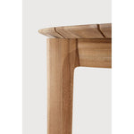 Featuring Bok Outdoor Dining Table Teak by Ethnicraft at Amethyst Home. Reminiscent of a goat's curved horns, the Bok collection combines sculptural elegance and contemporary crafting into a graceful and airy form. Just like its matching chair, the Bok dining table is another signature design. Its airy shape yet rock-solid construction make this piece a timel. Amethyst Home provides interior design, new home construction design consulting, vintage area rugs, and lighting in the Seattle metro area.