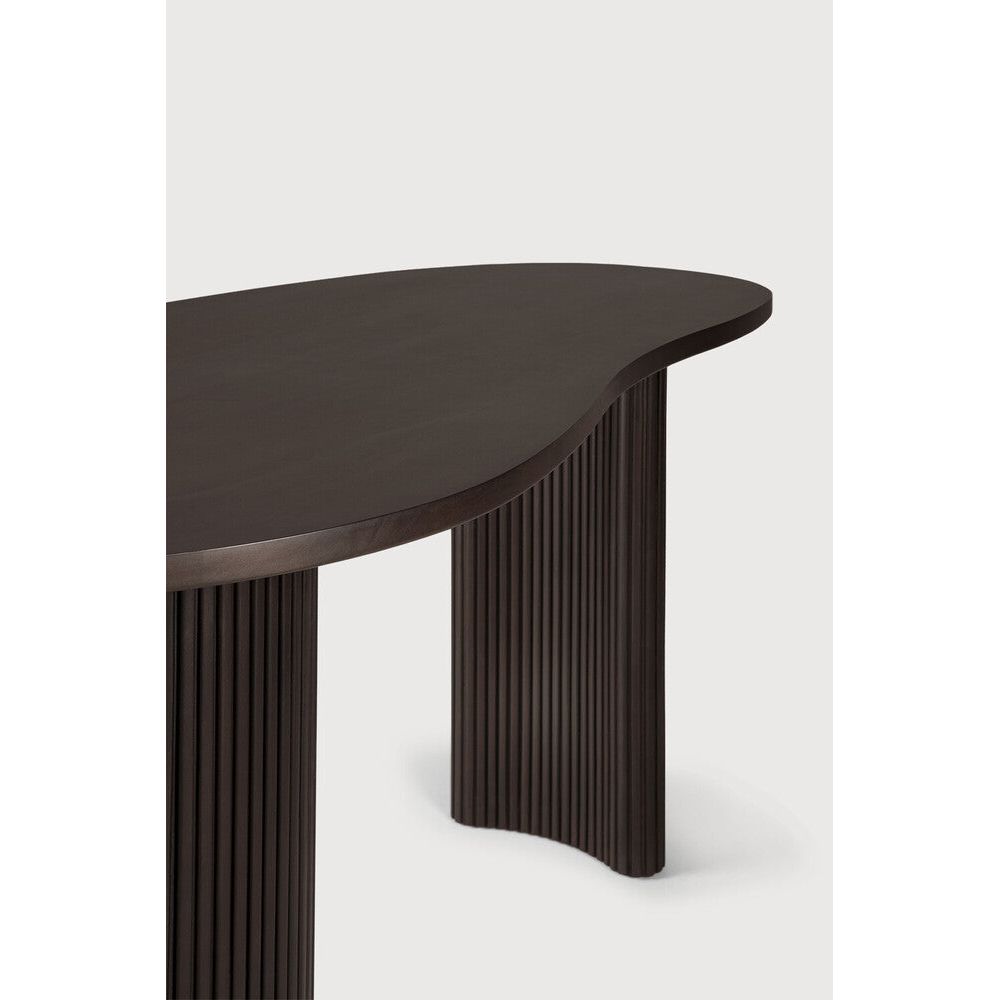 Featuring Boomerang Mahogany Dark Brown Desk by Ethnicraft at Amethyst Home. Inspired by shapes found in nature, the Boomerang collection features a playful, pebble top set on curved legs with a stacked, wood stick effect. The Boomerang desk is a statement piece for any workspace with its organic, eye-catching design unique for the office.
Dimensions: 33". Amethyst Home provides interior design, new home construction design consulting, vintage area rugs, and lighting in the Kansas City metro area.