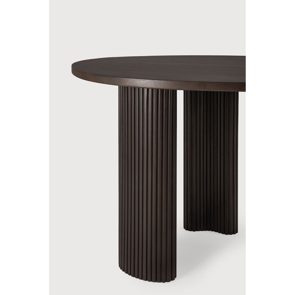 Featuring Boomerang Mahogany Dark Brown Desk by Ethnicraft at Amethyst Home. Inspired by shapes found in nature, the Boomerang collection features a playful, pebble top set on curved legs with a stacked, wood stick effect. The Boomerang desk is a statement piece for any workspace with its organic, eye-catching design unique for the office.
Dimensions: 33"d . Amethyst Home provides interior design, new home construction design consulting, vintage area rugs, and lighting in the Nashville metro area.