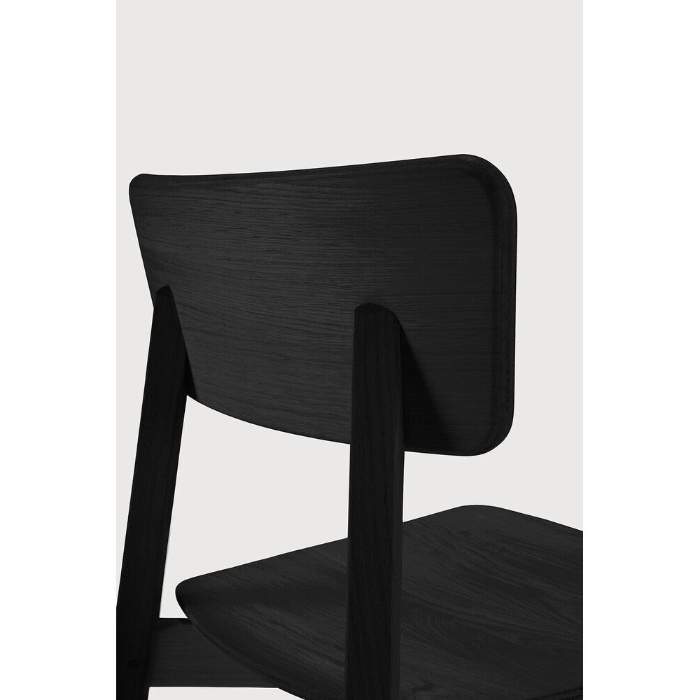 Featuring Casale Dining Chair Oak Black by Ethnicraft at Amethyst Home. Designed by Studio Kaschkasch, the Casale chair boasts straight lines to form a smooth, delicate shape, and the effortless design makes the graceful chair an adaptable piece.
Dimensions: 20.5"d x 18.5"w x 31.5"h
Finish : VarnishedFloor Protector : YesMain Material : OakSolid wood : Y. Amethyst Home provides interior design, new home construction design consulting, vintage area rugs, and lighting in the Laguna Beach metro area.
