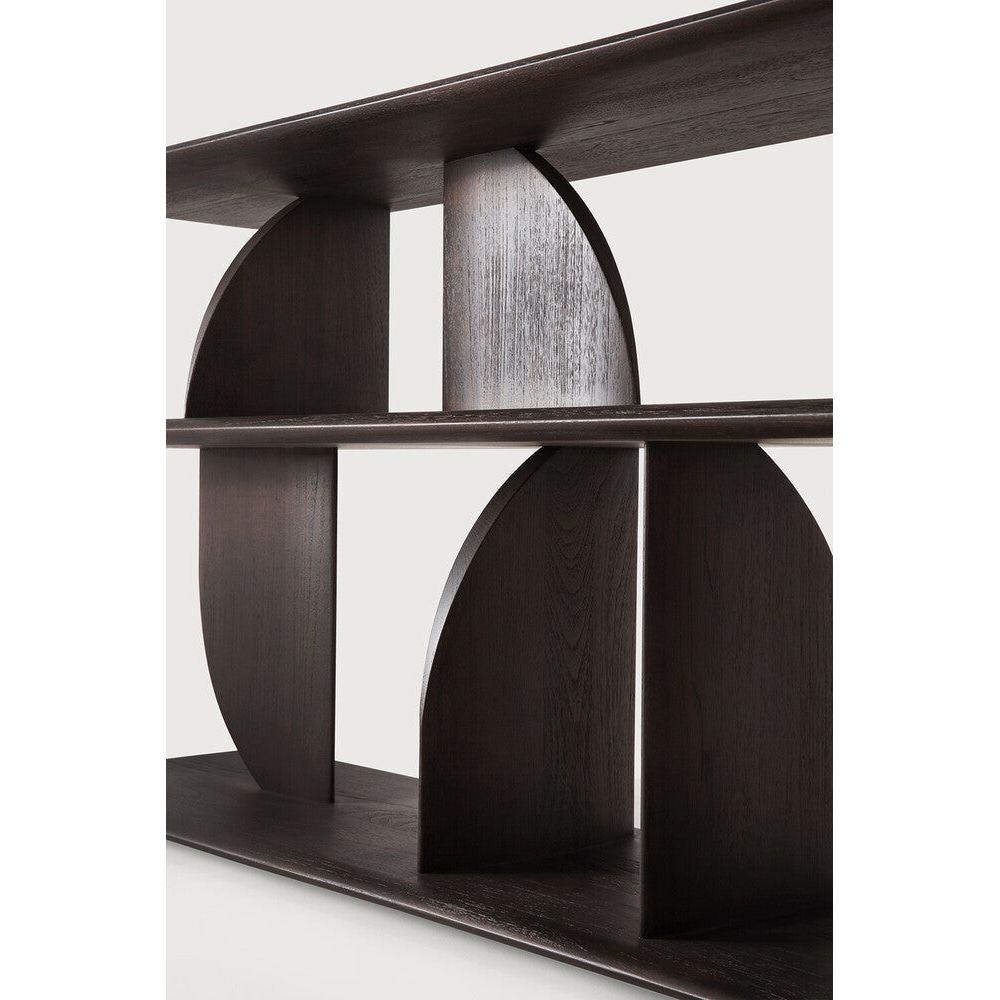 Featuring Geometric Sofa Console Teak Dark Brown by Ethnicraft at Amethyst Home. In the Geometric collection, shapes intersect in unexpected ways, creating playful contrasts with light and shadow at every angle. The Geometric console offers an eye-catching addition to an entry or hallway.
Dimensions: 14"d x 83"w x 26.5"h
Brushed : NoColor : DarkFinish : Varn. Amethyst Home provides interior design, new home construction design consulting, vintage area rugs, and lighting in the Portland metro area.