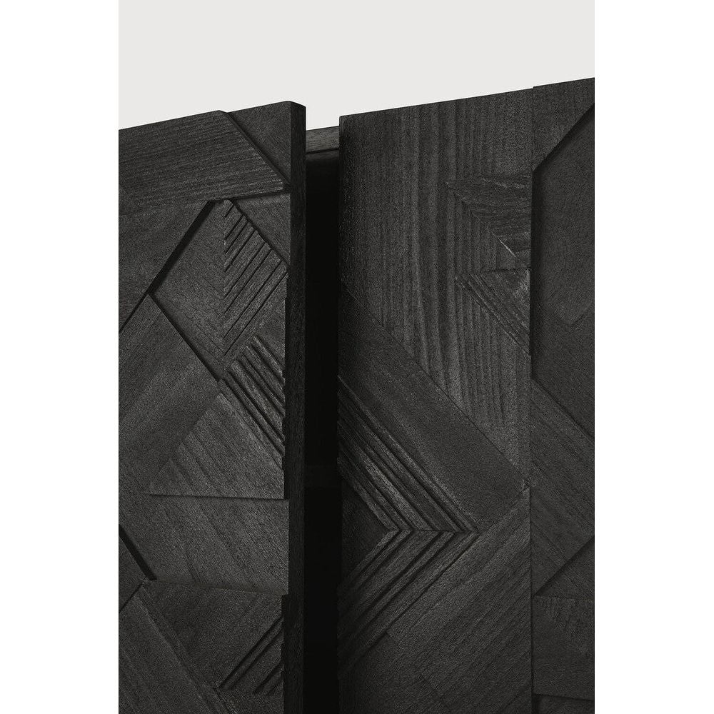 Featuring Graphic Sideboard Teak Black by Ethnicraft at Amethyst Home. In his quest to add movement to the surface, designer Alain van Havre started layering and combining triangular shapes. Before he knew it he had created a visually enticing composition out of teak and the Graphic design was born. By using multiple layers, a sense of depth and dynamism . Amethyst Home provides interior design, new home construction design consulting, vintage area rugs, and lighting in the Los Angeles metro area.