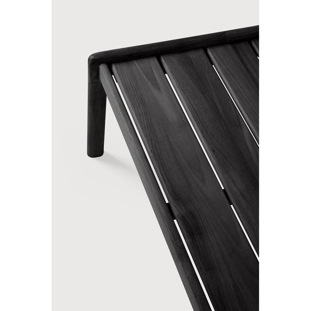 Featuring Jack Outdoor Coffee Table Teak Black by Ethnicraft at Amethyst Home. Alluring from every angle, luxuriant shapes and curves form the basis of the Jack collection. Designed to attract attention with the same clean and classic lines, place the Jack coffee table as a single item or arranged together in a composition specific to your needs.
Dimensions: 2. Amethyst Home provides interior design, new home construction design consulting, vintage area rugs, and lighting in the Boston metro area.