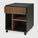 Featuring Oscar Drawer Unit Teak black by Ethnicraft at Amethyst Home. Bringing form and function to your professional way of life, the Oscar collection ticks the right boxes. Featuring hand-carved details in solid teak and the practicality of wheels, the Oscar drawer unit can serve many purposes, fitting perfectly under a desk for extra storage or as a standa. Amethyst Home provides interior design, new home construction design consulting, vintage area rugs, and lighting in the Boston metro area.