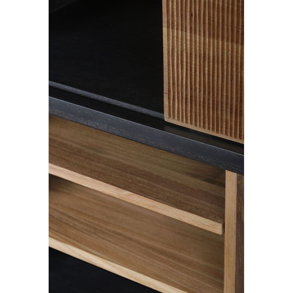 Featuring Oscar Rack Teak by Ethnicraft at Amethyst Home. The Oscar rack, designed by Alain van Havre, immediately attracts attention with its atypical compartment division. Notice the exceptional grooves in the doors: each narrow groove was carefully hand carved, making every Oscar piece unique.
Dimensions: 16"d x 47.5"w x 77"h
Anti-tipping mechanism : Yes. Amethyst Home provides interior design, new home construction design consulting, vintage area rugs, and lighting in the Nashville metro area.