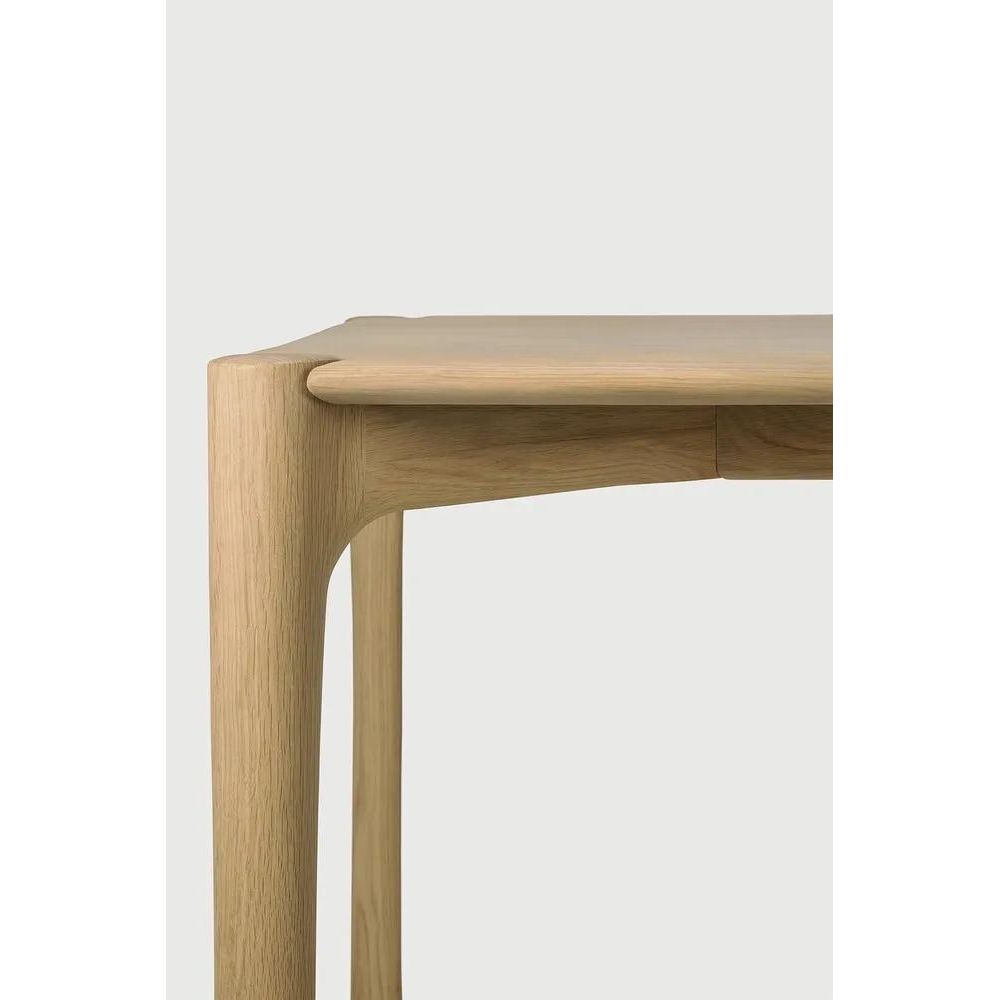 Featuring PI Dining Table by Ethnicraft at Amethyst Home. The PI collection honours nature’s design by keeping the strength, curves and lines, as nature intended. Interesting shapes are discovered in this sleek and stylish, polished imperfect, finish. Each PI dining table is finished by hand to ensure that the individual character of the wood is respected. D. Amethyst Home provides interior design, new home construction design consulting, vintage area rugs, and lighting in the Portland metro area.