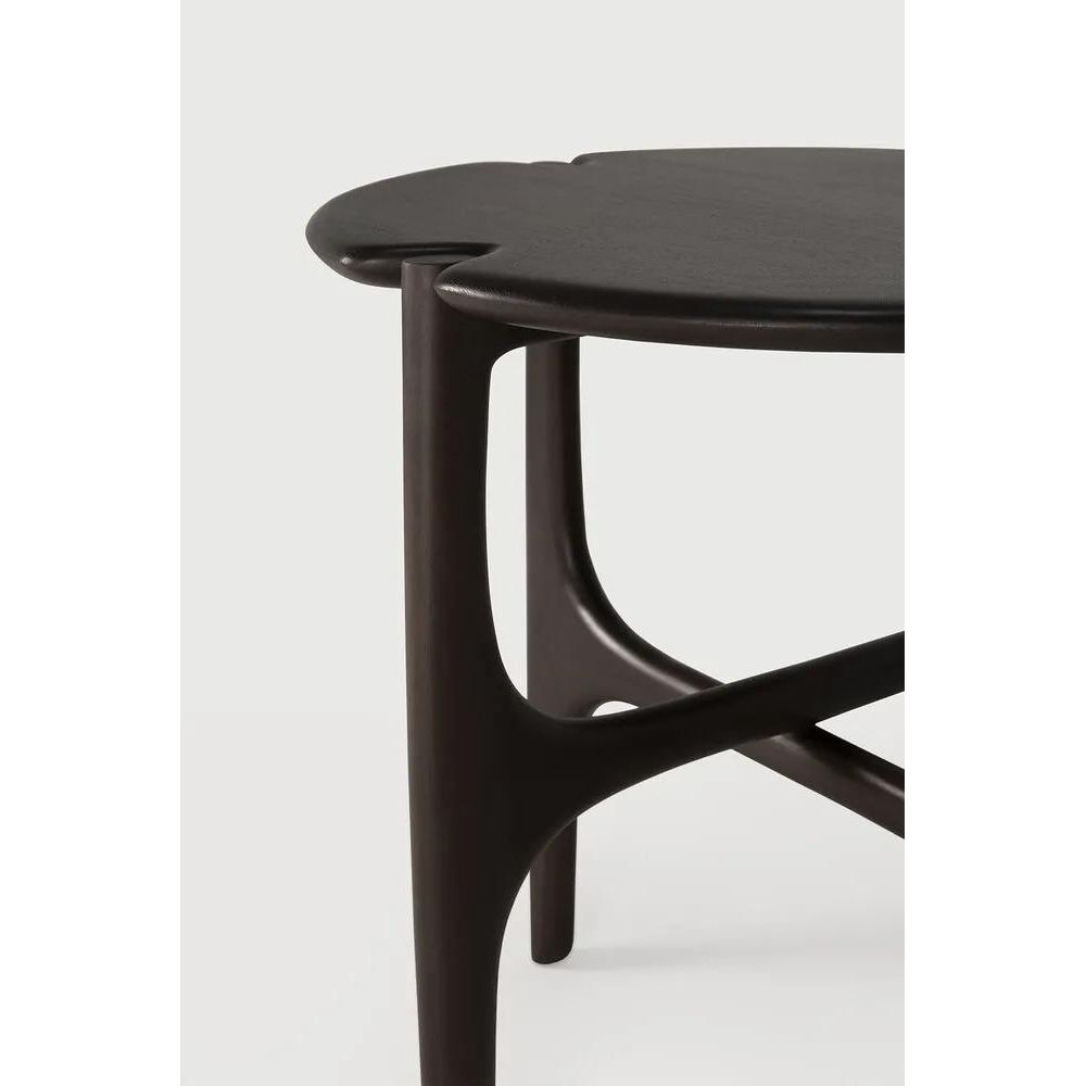 Featuring PI Side Table by Ethnicraft at Amethyst Home. The PI collection honors nature’s design, by keeping the strength, curves, and lines, as nature intended. Interesting shapes are discovered in this sleek and stylish, polished imperfect, finish. Each PI side table is finished by hand to ensure that the individual character of the wood is respected. Designe. Amethyst Home provides interior design, new home construction design consulting, vintage area rugs, and lighting in the Omaha metro area.