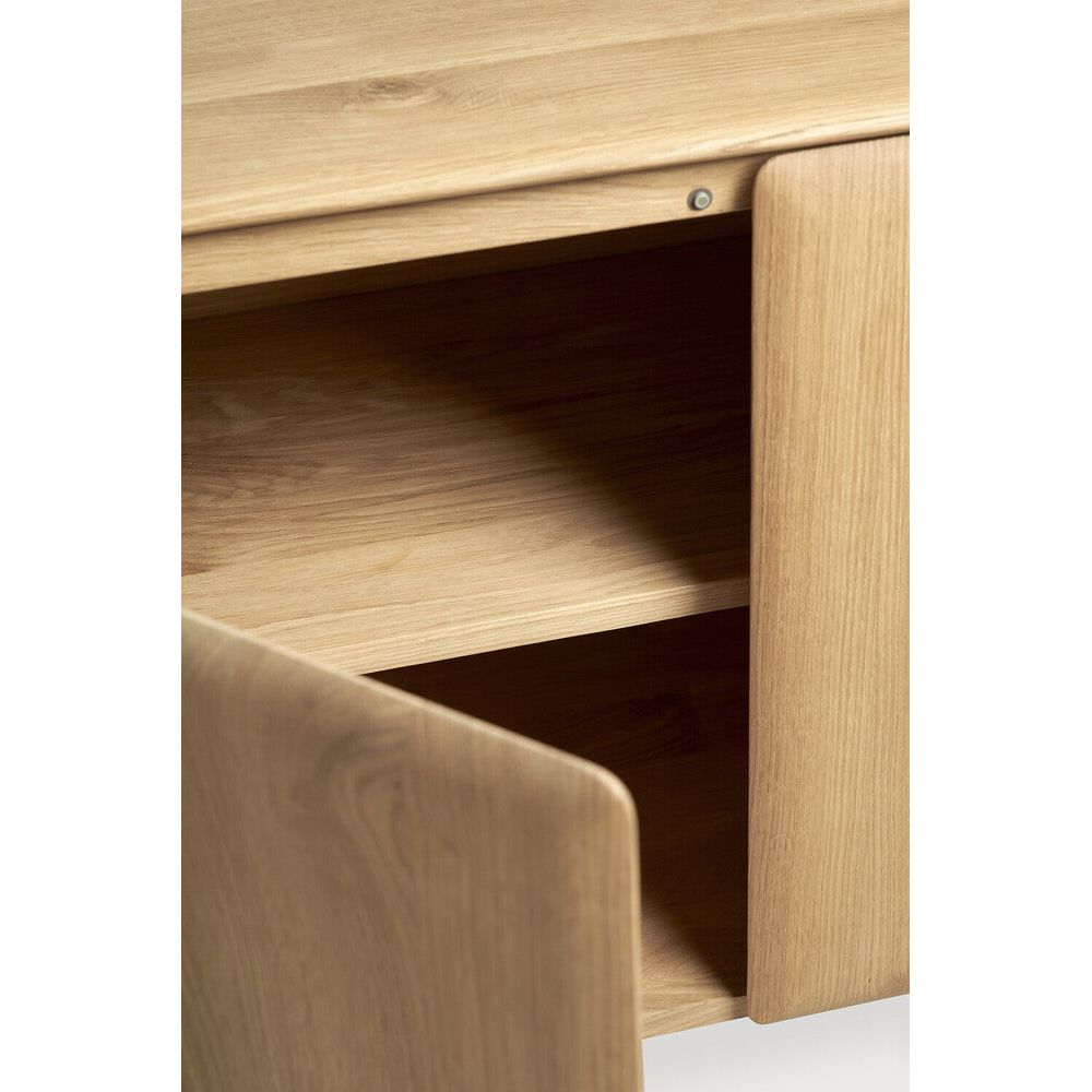 Featuring PI Sideboard Oak by Ethnicraft at Amethyst Home. The PI collection honours nature’s design by keeping the strength, curves and lines, as nature intended. Interesting shapes are discovered in this sleek and stylish, polished imperfect, finish. Each PI item is finished by hand to ensure that the individual character of the wood is respected. The PI sid. Amethyst Home provides interior design, new home construction design consulting, vintage area rugs, and lighting in the Dallas metro area.