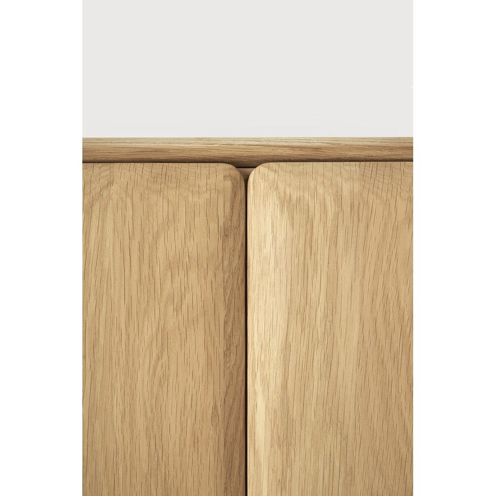 Featuring PI Sideboard Oak by Ethnicraft at Amethyst Home. The PI collection honours nature’s design by keeping the strength, curves and lines, as nature intended. Interesting shapes are discovered in this sleek and stylish, polished imperfect, finish. Each PI item is finished by hand to ensure that the individual character of the wood is respected. The PI. Amethyst Home provides interior design, new home construction design consulting, vintage area rugs, and lighting in the Scottsdale metro area.