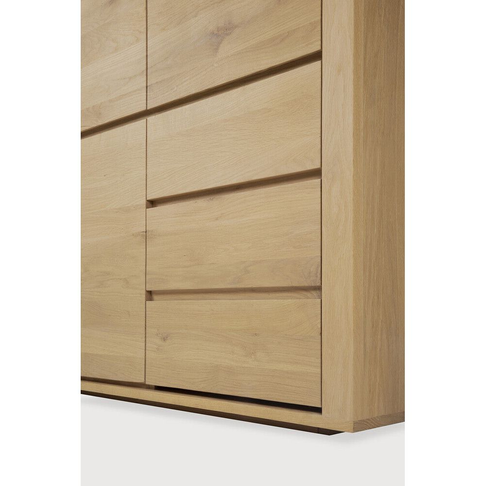 Featuring Shadow Dresser Oak by Ethnicraft at Amethyst Home. Durable, elegant and convenient, the Shadow dresser features three doors and two drawers. Made from solid oak.
Dimentions: 24"d x 45.5"w x 79"h
Anti-tipping mechanism : YesFinish : OiledMain Material : OakSolid wood : Yes. Amethyst Home provides interior design, new home construction design consulting, vintage area rugs, and lighting in the Alpharetta metro area.