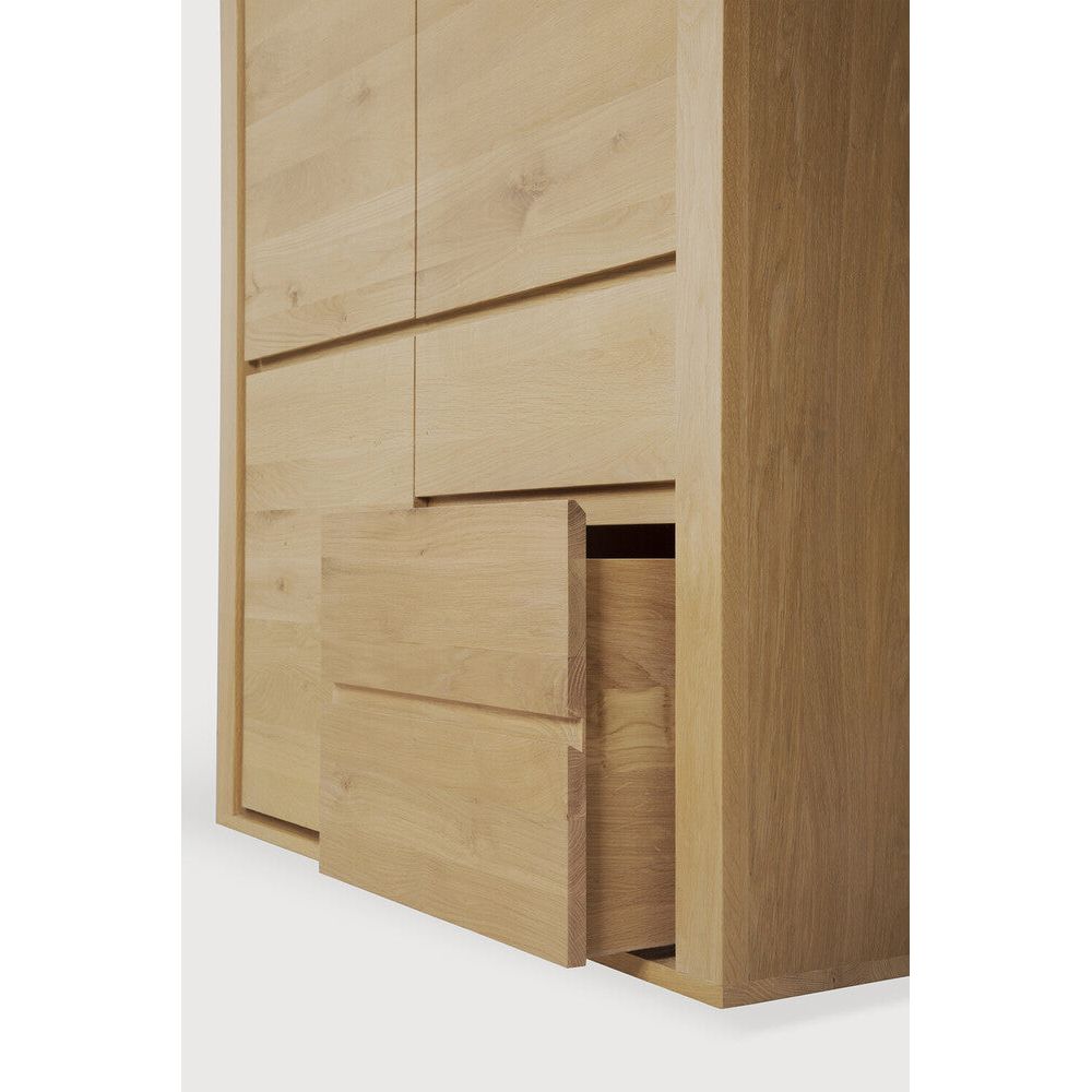 Featuring Shadow Dresser Oak by Ethnicraft at Amethyst Home. Durable, elegant and convenient, the Shadow dresser features three doors and two drawers. Made from solid oak.
Dimentions: 24"d x 45.5"w x 79"h
Anti-tipping mechanism : YesFinish : OiledMain Material : OakSolid wood : Yes. Amethyst Home provides interior design, new home construction design consulting, vintage area rugs, and lighting in the Salt Lake City metro area.