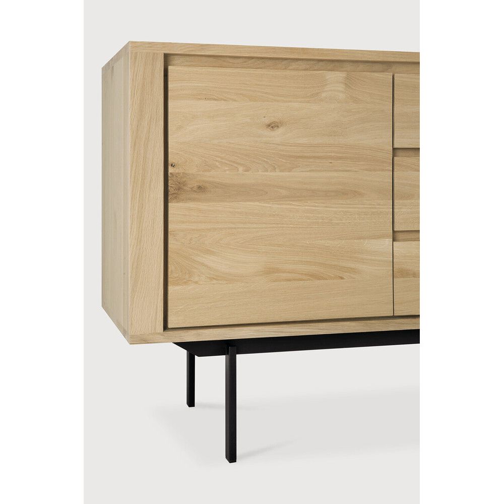 Featuring Shadow Sideboard by Ethnicraft at Amethyst Home. The Shadow collection is straightforward and robust with decisive lines. This more recent design with black metal legs, giving the design room to breathe, elevates this sideboard to new heights.
Dimensions: 18"d x 53"w x 31.5"h
Adjustable Shelves : YesAnti-tipping mechanism : YesFinish : OiledMain Mater. Amethyst Home provides interior design, new home construction design consulting, vintage area rugs, and lighting in the Miami metro area.