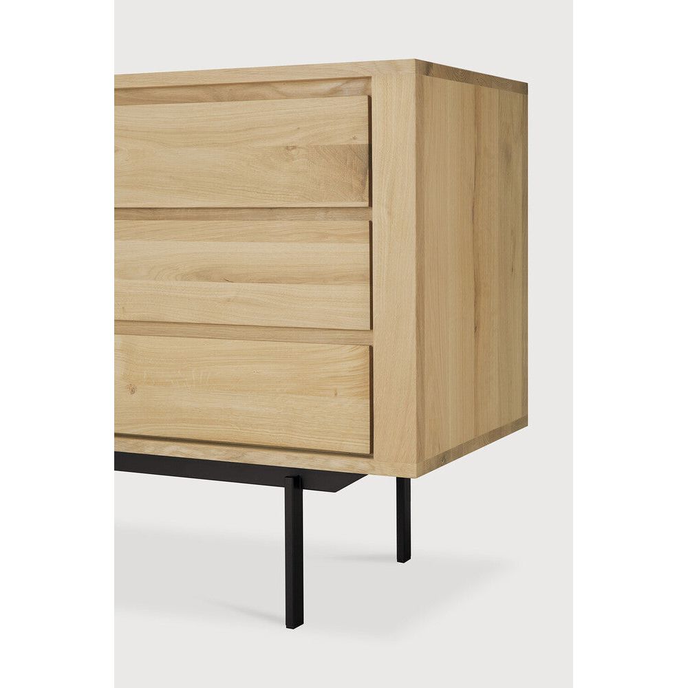 Featuring Shadow Sideboard by Ethnicraft at Amethyst Home. The Shadow collection is straightforward and robust with decisive lines. This more recent design with black metal legs, giving the design room to breathe, elevates this sideboard to new heights.
Dimensions: 18"d x 53"w x 31.5"h
Adjustable Shelves : YesAnti-tipping mechanism : YesFinish : OiledMain Ma. Amethyst Home provides interior design, new home construction design consulting, vintage area rugs, and lighting in the Monterey metro area.