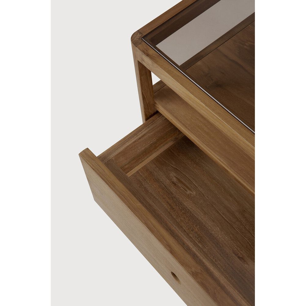 Featuring Spindle Bedside Table Reclaimed Teak by Ethnicraft at Amethyst Home. With its one drawer, open space and slightly tapered legs, the Spindle bedside table is the perfect no-nonsense companion for the striking Spindle bed. Reclaimed teak offers a truly unique finish for each and every item — the origin of each hand-finished piece of furniture ca. Amethyst Home provides interior design, new home construction design consulting, vintage area rugs, and lighting in the Winter Garden metro area.