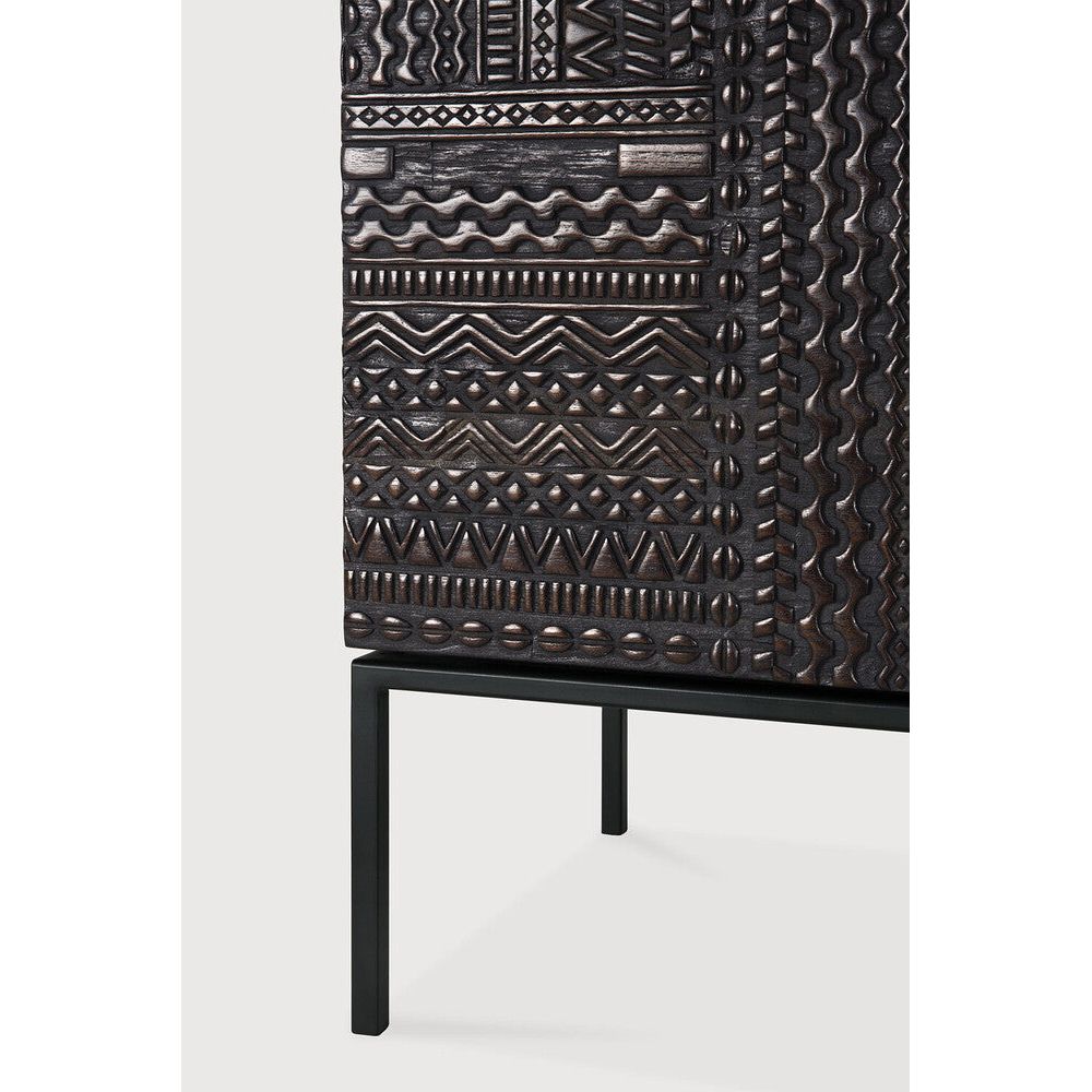Featuring Tabwa Sideboard Teak Black by Ethnicraft at Amethyst Home. The Tabwa collection offers timeless centerpieces of minimalistic silhouette with a unique and distinct character. Contemporary wooden furniture are transformed into unique pieces of art where each pattern is carefully carved by our artisans. Named after the Tabwa culture from Central Af. Amethyst Home provides interior design, new home construction design consulting, vintage area rugs, and lighting in the Los Angeles metro area.