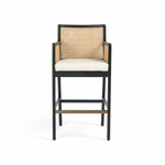 Featuring Antonia Cane Brushed Ebony Bar Stool by Four Hands at Amethyst Home. We love the retro look the cane brings to this Antonia Brushed Ebony Cane Bar Stool. A stunning piece to complete a retro aesthetic in any kitchen or bar area. 
Size: 22"W x 22.50"L x 43"HArm Height from Floor: 37.40" Arm Height from Seat: 6.10" Arm Length: 18.90" Arm Width.  Amethyst Home provides interior design, new home construction design consulting, vintage area rugs, and lighting in the Salt Lake City metro area.