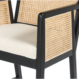 Featuring Antonia Cane Brushed Ebony Bar Stool by Four Hands at Amethyst Home. We love the retro look the cane brings to this Antonia Brushed Ebony Cane Bar Stool. A stunning piece to complete a retro aesthetic in any kitchen or bar area. 
Size: 22"W x 22.50"L x 43"HArm Height from Floor: 37.40" Arm Height from Seat: 6.10" Arm Length: 18.90" Arm Width: 1.10".  Amethyst Home provides interior design, new home construction design consulting, vintage area rugs, and lighting in the Seattle metro area.