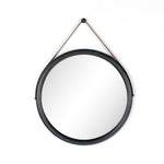 Featuring Des Mirror by Four Hands at Amethyst Home. The Des Mirror is hung by a handsome, toffee-colored top grain leather strap. We love the fresh take on what would otherwise be a traditional, round mirror. The mirror is framed in black-washed popular and would like amazing hung in an entryway, bedroom, or other space. 
Overall Dimensions: 30"W x 1.50.  Amethyst Home provides interior design, new home construction design consulting, vintage area rugs, and lighting in the Kansas City metro area.