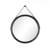 Featuring Des Mirror by Four Hands at Amethyst Home. The Des Mirror is hung by a handsome, toffee-colored top grain leather strap. We love the fresh take on what would otherwise be a traditional, round mirror. The mirror is framed in black-washed popular and would like amazing hung in an entryway, bedroom, or other space. 
Overall Dimensions: 30"W x 1.50.  Amethyst Home provides interior design, new home construction design consulting, vintage area rugs, and lighting in the Kansas City metro area.