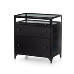 Featuring Shadow Box Nightstand by Four Hands at Amethyst Home. This Shadow Box Nightstand is finished in a gorgeous matte black. We love that the glass top allows you to showcase your favorite jewelry or family keepsake, while the two spacious drawers give you storage space. The knobs are finished in bronze to give this piece a sleek contrast. 
Overa.  Amethyst Home provides interior design, new home construction design consulting, vintage area rugs, and lighting in the Salt Lake City metro area.