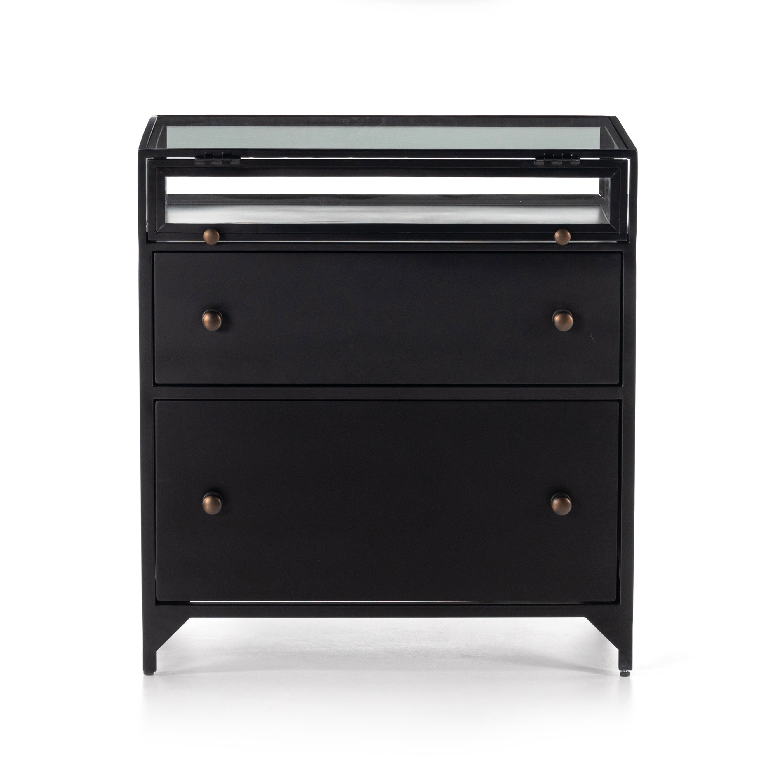 Featuring Shadow Box Nightstand by Four Hands at Amethyst Home. This Shadow Box Nightstand is finished in a gorgeous matte black. We love that the glass top allows you to showcase your favorite jewelry or family keepsake, while the two spacious drawers give you storage space. The knobs are finished in bronze to give this piece a sleek contrast. 
Overall Dimen.  Amethyst Home provides interior design, new home construction design consulting, vintage area rugs, and lighting in the Austin metro area.
