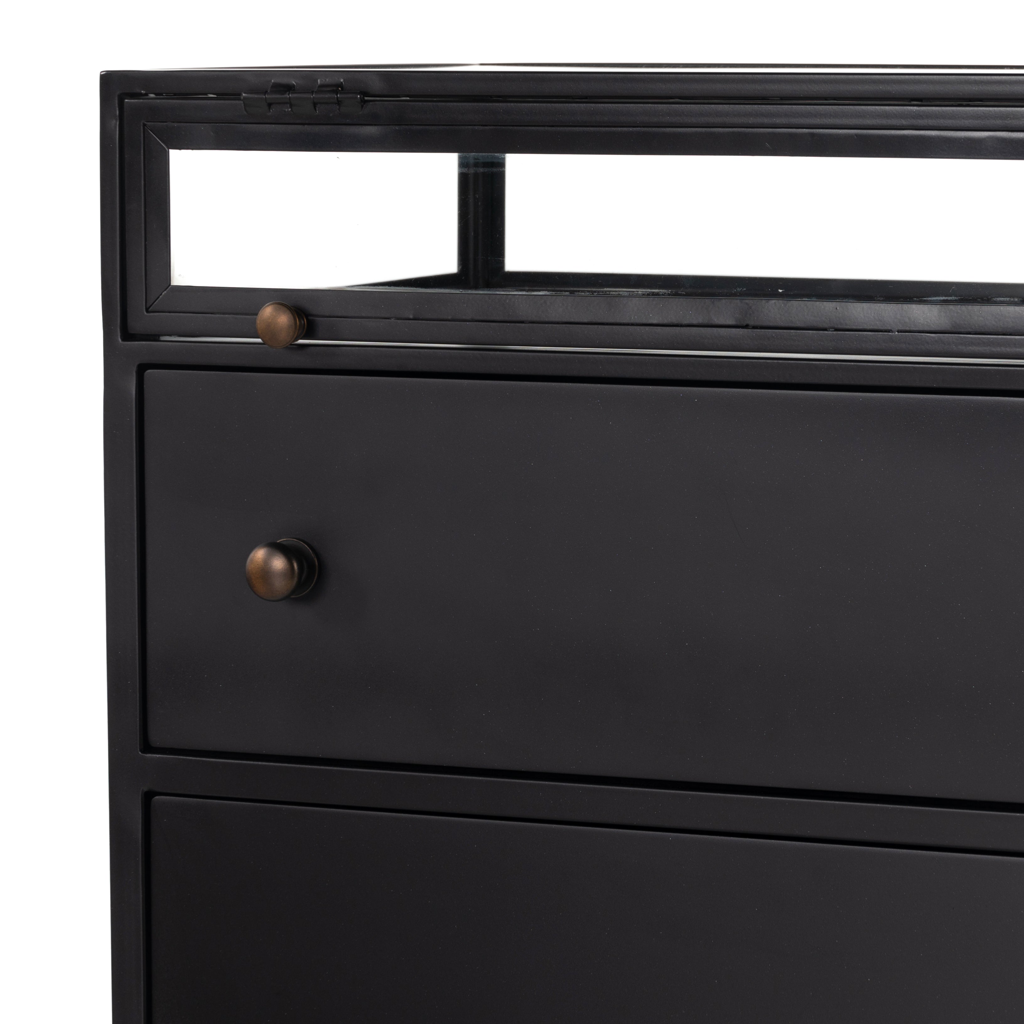 Featuring Shadow Box Nightstand by Four Hands at Amethyst Home. This Shadow Box Nightstand is finished in a gorgeous matte black. We love that the glass top allows you to showcase your favorite jewelry or family keepsake, while the two spacious drawers give you storage space. The knobs are finished in bronze to give this piece a sleek contrast. 
Overall Dimens.  Amethyst Home provides interior design, new home construction design consulting, vintage area rugs, and lighting in the Tampa metro area.