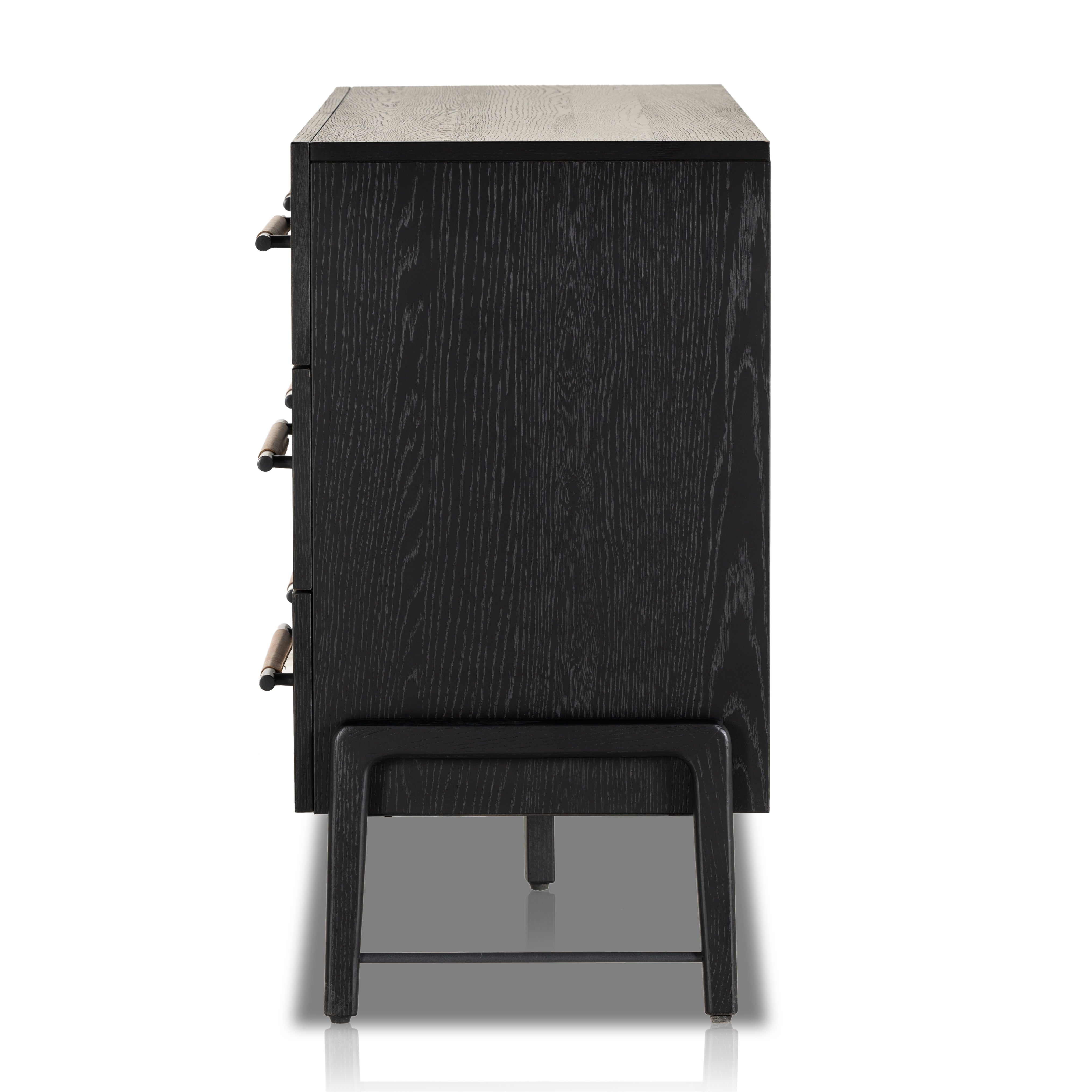 Featuring Rosedale Ebony Oak 6 Drawer Dresser by Four Hands at Amethyst Home. The ebony oak of this Rosedale 6 Drawer Dresser brings a moody, darkness to any room. With six spacious drawers and iron hardware wrapped in a gorgeous, tan leather, this is a functional and beautiful piece to add to your bedroom or other area. 
Overall Dimensions: 62.50"W x 19.50. Amethyst Home provides interior design, new home construction design consulting, vintage area rugs, and lighting in the Charlotte metro area.