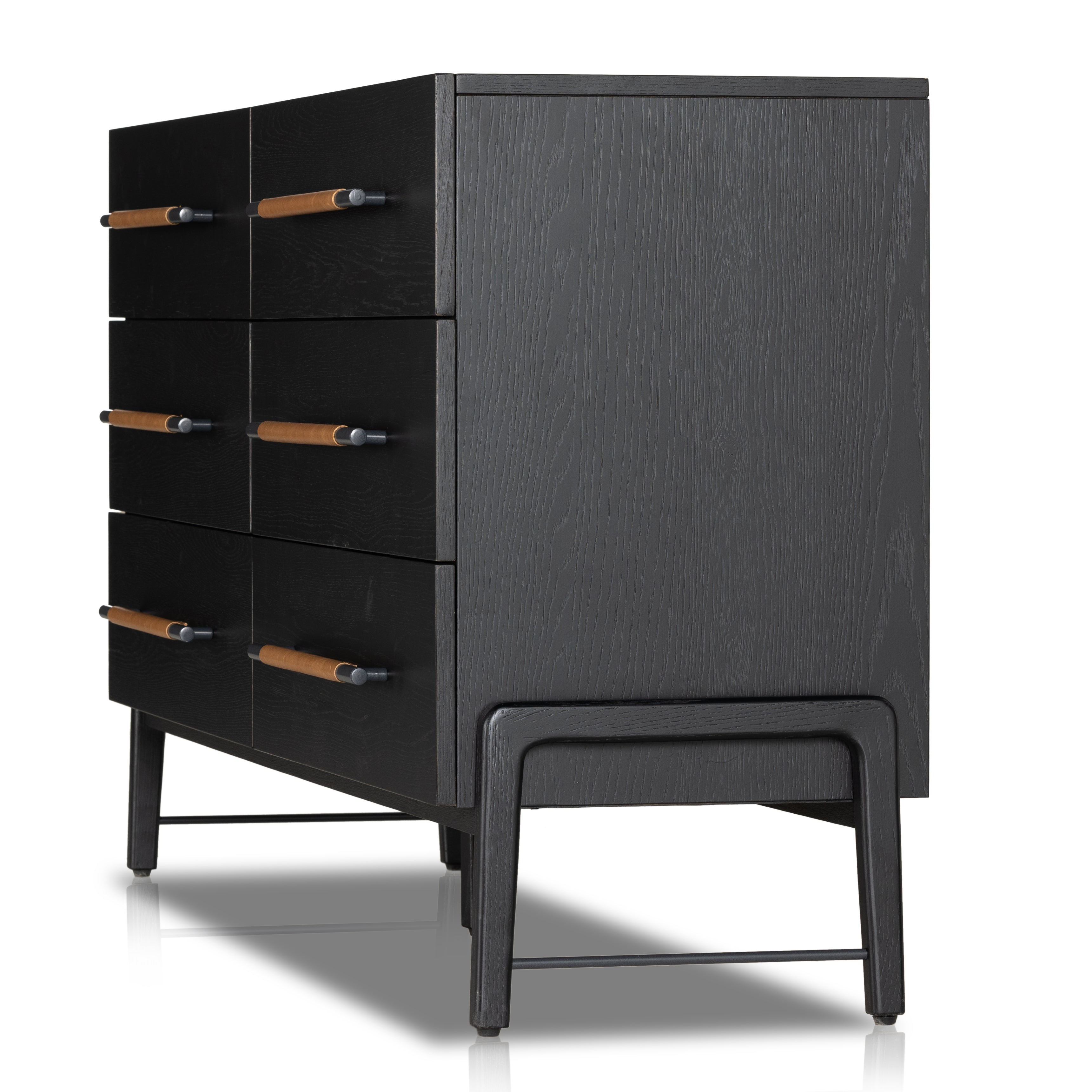 Featuring Rosedale Ebony Oak 6 Drawer Dresser by Four Hands at Amethyst Home. The ebony oak of this Rosedale 6 Drawer Dresser brings a moody, darkness to any room. With six spacious drawers and iron hardware wrapped in a gorgeous, tan leather, this is a functional and beautiful piece to add to your bedroom or other area. 
Overall Dimensions: 62.50"W x 19.50". Amethyst Home provides interior design, new home construction design consulting, vintage area rugs, and lighting in the Portland metro area.