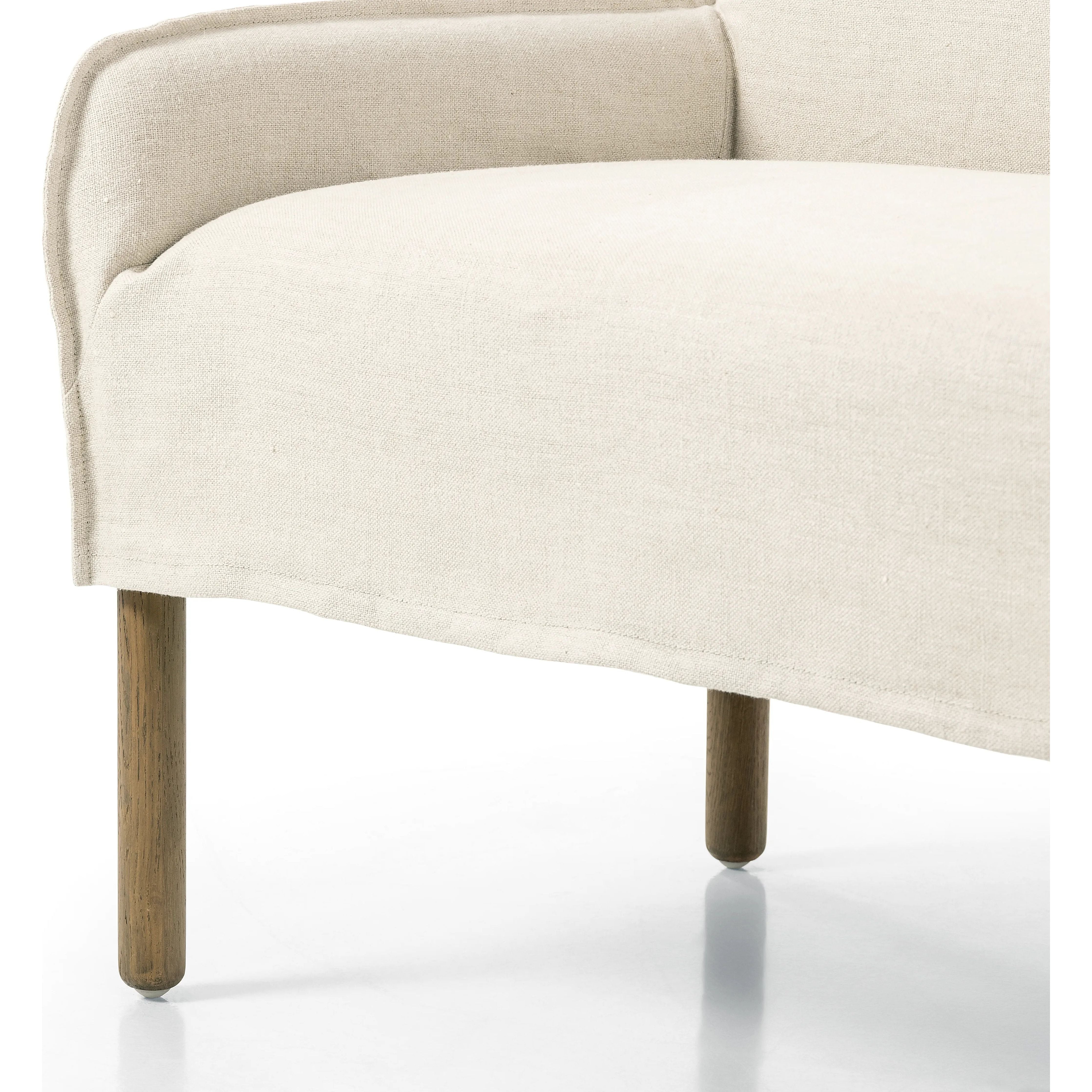 Featuring Addington Brussels Natural Slipcover Bench by Four Hands at Amethyst Home. Introducing a sustainable take on slipcovered seating. A relaxed dining bench is upholstered in soft, sustainably made Belgian Linen™, with solid oak legs. Libeco™-sourced Belgian linens are 100% natural and free of toxic chemicals. Certified Oeko-Tex® STANDARD 100, sl. Amethyst Home provides interior design, new home construction design consulting, vintage area rugs, and lighting in the Calabasas metro area.