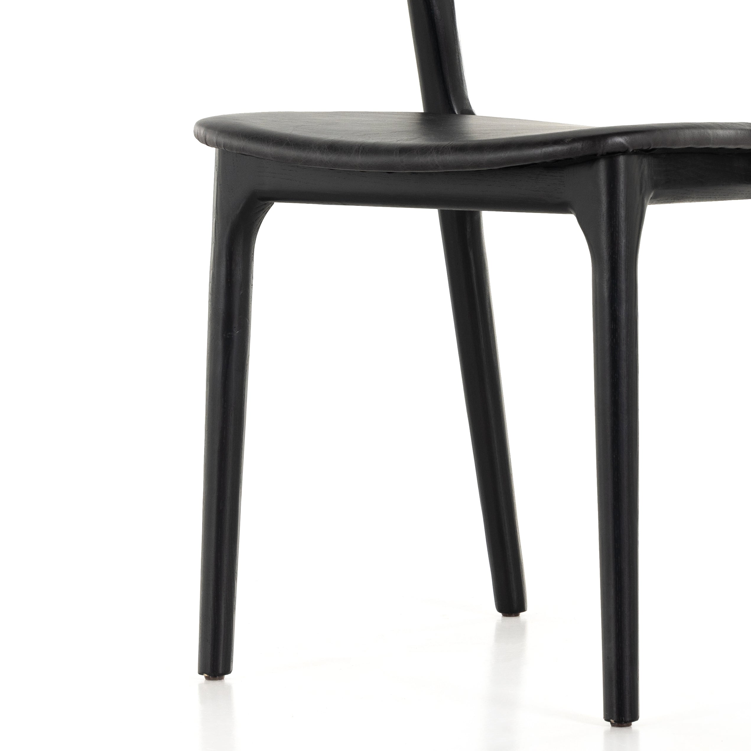 Featuring Amare Sonoma Black Dining Chair by Four Hands at Amethyst Home. Inspired by clean, simple Scandinavian styling, solid ash forms a shapely, open frame for top-grain leather seating.Overall Dimensions: 19"W x 22"L x 32"H
Collection: AllstonColors: Black ,Sonoma BlackMaterials: Solid Ash ,Top Grain Leather Weight: 12.39 lbsSeat Depth: 17.13"Seat Height: 18.98"Seat Constructi. Amethyst Home provides interior design, new construction, custom furniture, and area rugs in the Seattle metro area.