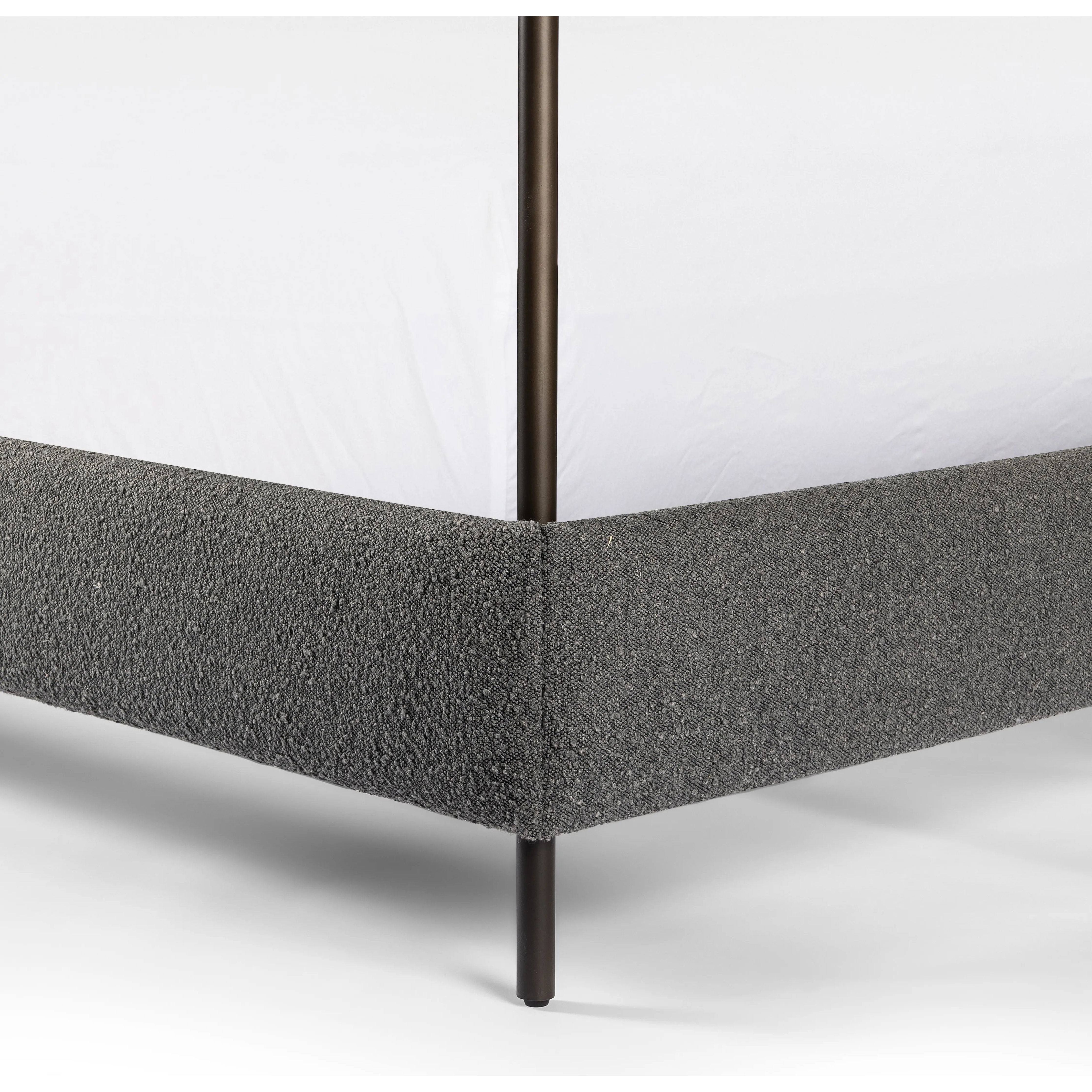 Featuring Anderson Knoll Charcoal-King Canopy Bed by Four Hands at Amethyst Home. Bring texture into play. This iron canopy bed features a headboard upholstered in a classic boucle fabric with decorative leather straps for a material-driven contrast. Standard box spring required. This bed is not compatible with an adjustable mattress.Overall Dimensions: 85"W. Amethyst Home provides interior design, new home construction design consulting, vintage area rugs, and lighting in the Portland metro area.