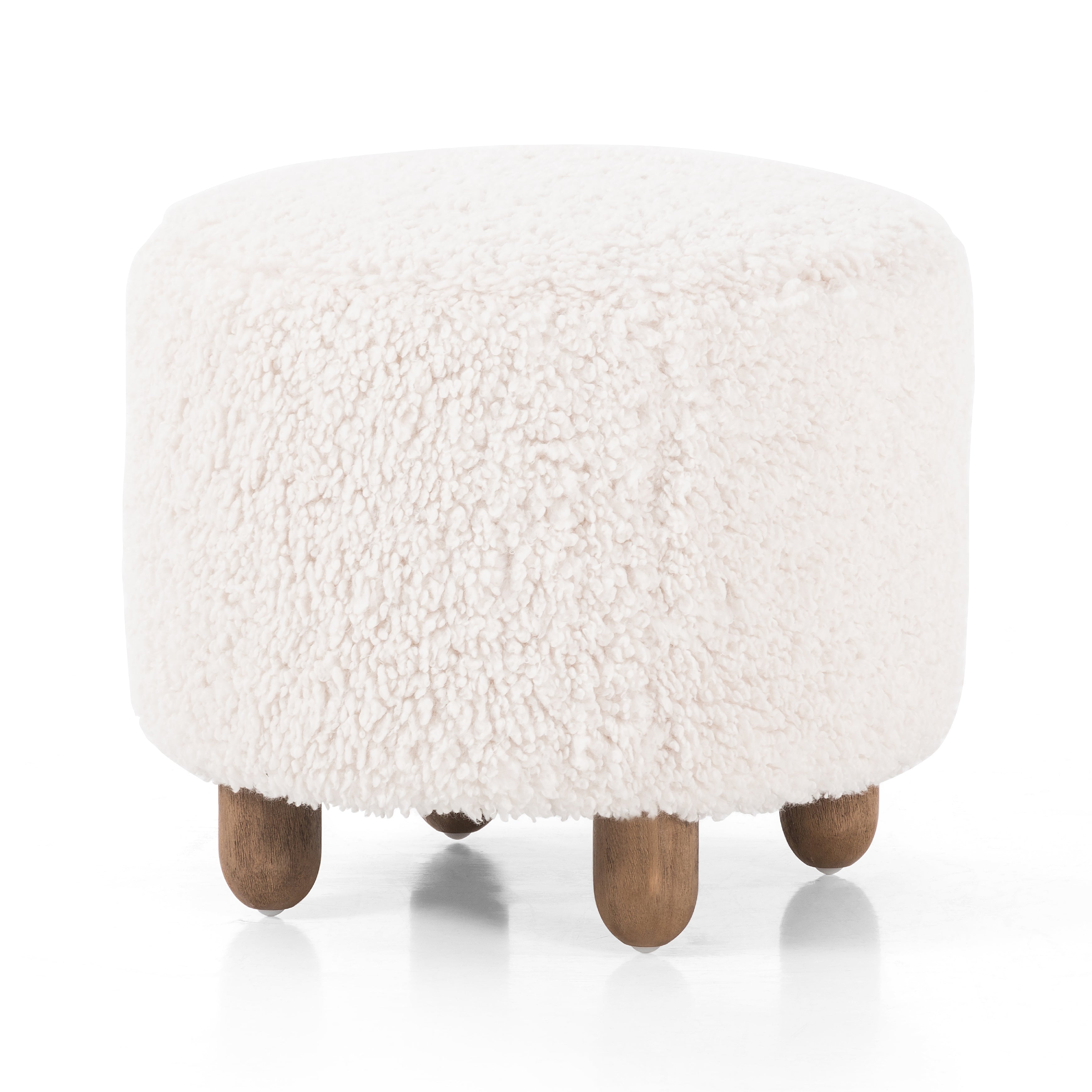 Featuring Aniston Andes Natural Ottoman by Four Hands at Amethyst Home. Place this round Aniston Andes Natural Ottoman just about anywhere for a subtle retro vibe. Upholstered in a faux Mongolian shearling with a high pile fur. Parawood legs are wirebrushed for a warm, vintage feel.
Overall Dimensions: 22.50"W x 22.50"L x 20.50"HWeight: 17.64 lbsVolume: 5.4 cu ft. Amethyst Home provides interior design services, furniture, rugs, and lighting in the Dallas metro area.