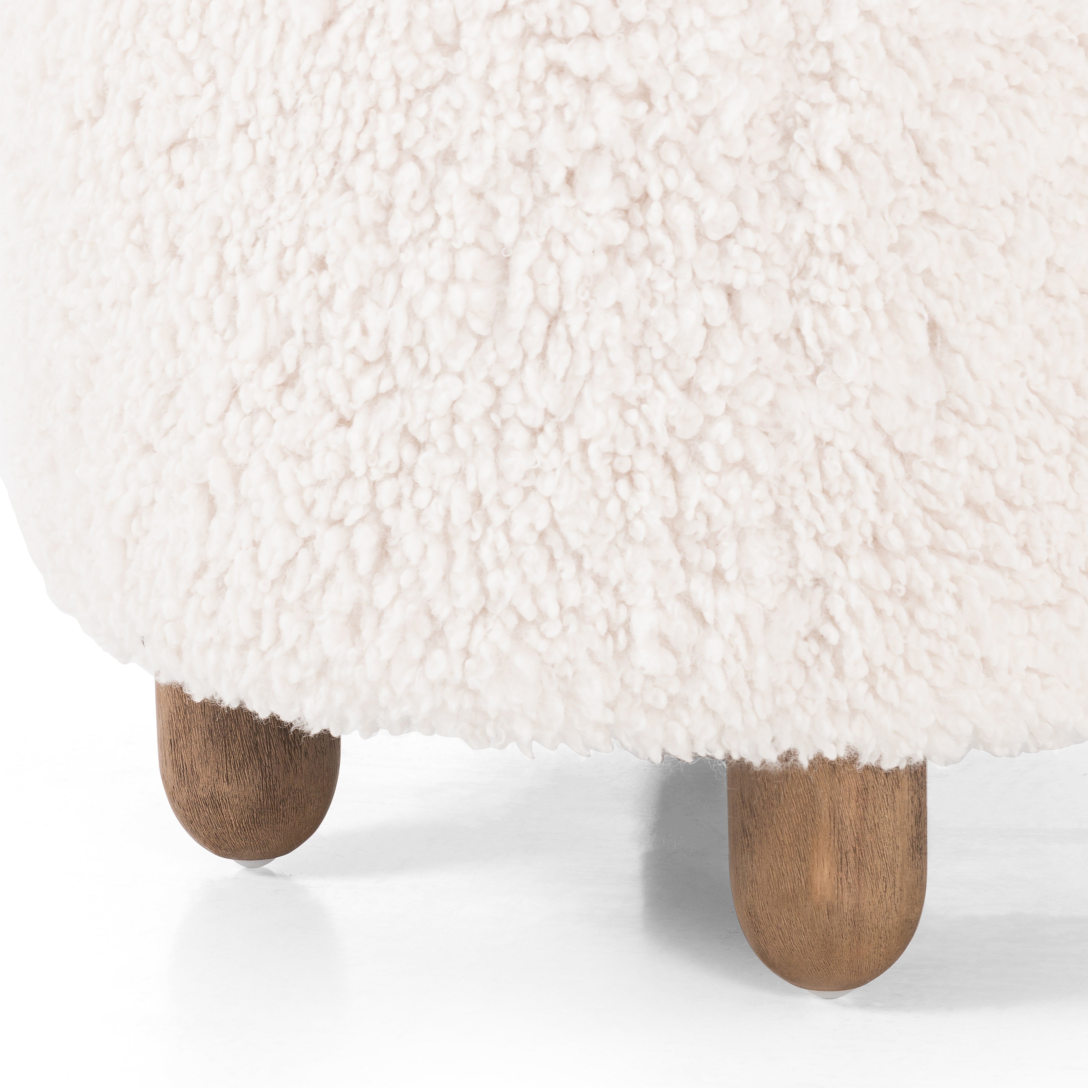 Featuring Aniston Andes Natural Ottoman by Four Hands at Amethyst Home. Place this round Aniston Andes Natural Ottoman just about anywhere for a subtle retro vibe. Upholstered in a faux Mongolian shearling with a high pile fur. Parawood legs are wirebrushed for a warm, vintage feel.
Overall Dimensions: 22.50"W x 22.50"L x 20.50"HWeight: 17.64 lbsVolume: 5.4 cu ft. Amethyst Home provides interior design services, furniture, rugs, and lighting in the Des Moines metro area.