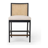 Featuring Antonia  Armless Dining Stool Stool by Four Hands at Amethyst Home. Light-toasted parawood frames a textural inlay of natural cane for a clean, monochromatic look, with seating of performance fabric for smart sensibility. Perfectly sized for the counter, with a brass kick plate for comfort and contrast. Performance fabrics are specially created to withstand spills, stains, . Amethyst Home provides interior design, new construction, custom furniture, and area rugs in the Omaha metro area.