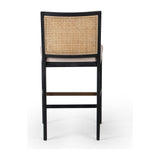 Featuring Antonia  Armless Dining Stool Stool by Four Hands at Amethyst Home. Light-toasted parawood frames a textural inlay of natural cane for a clean, monochromatic look, with seating of performance fabric for smart sensibility. Perfectly sized for the counter, with a brass kick plate for comfort and contrast. Performance fabrics are specially created to withstand spills, stains, . Amethyst Home provides interior design, new construction, custom furniture, and area rugs in the Tampa metro area.